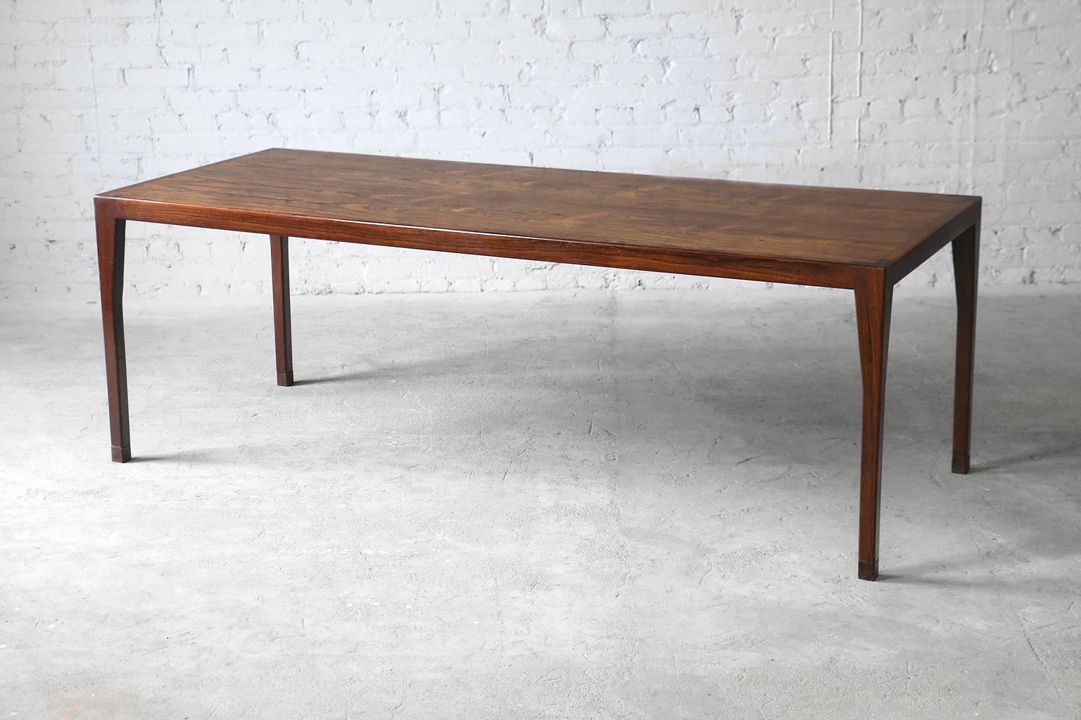 - rarely seen design in rosewood
- solid rosewood frame
- exposed end grain on leg joint

A seldom seen Hans Wegner work table for Johannes Hansen. This example was used in the Johannes Hansen workshop. Originally designed for KAD (Women Workers