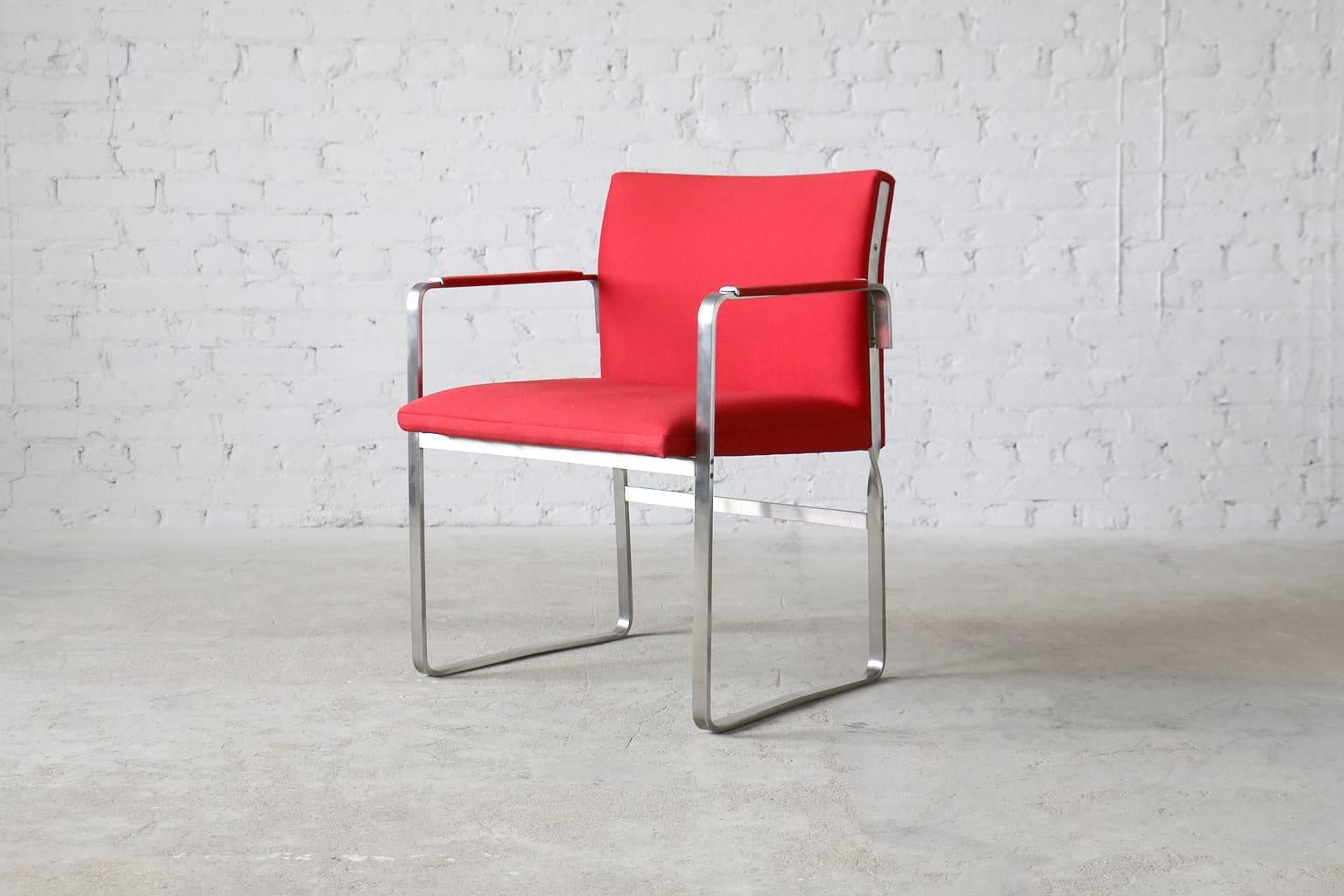 Model JH811.
Designed in 1970.
Chromed steel frame.
Newer weave fabric.

Attractive vintage armchairs designed by Hans Wegner for Danish manufacturer Johannes Hansen. This design features a unique chromed steel frame that supports a Danish