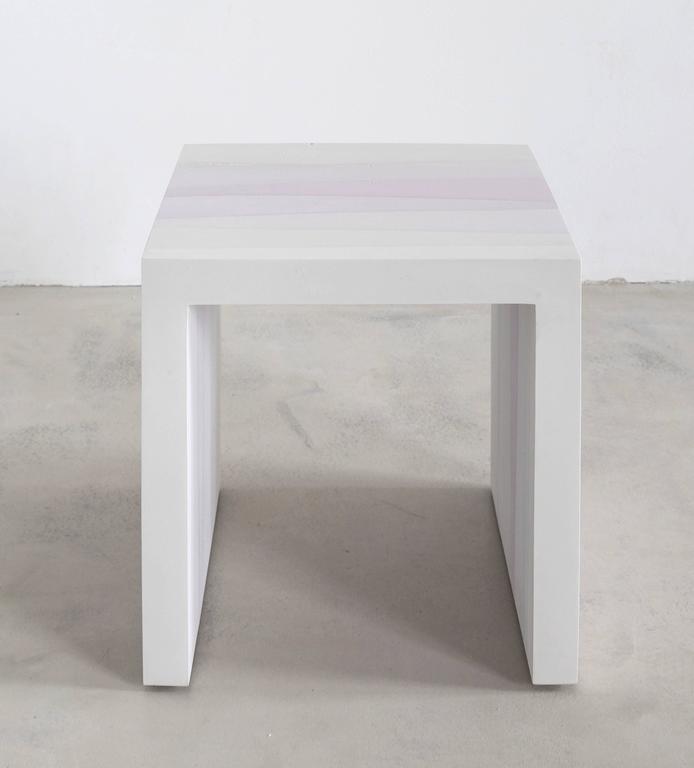 This made-to-order table consists of hand-dyed cement, poured in layers to create an ombre watercolor effect. The piece weighs approximately 65lbs. 8-10 weeks lead time. Custom options available, please inquire with the studio.
