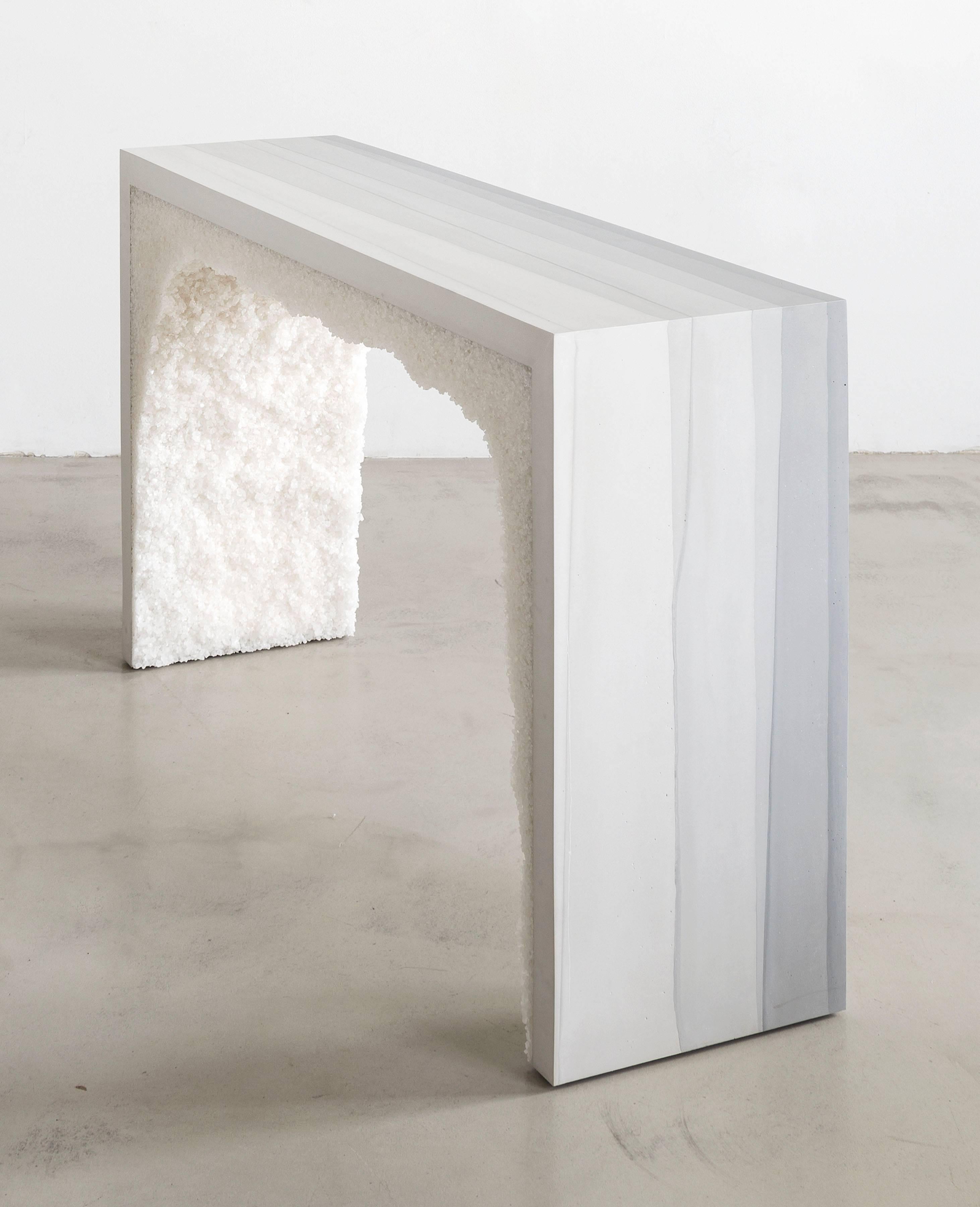 This console consists of a hand-dyed ombre cement exterior and a packed white rock salt interior. The silica is packed by hand within the cement in an organic nature. Custom options available, please inquire with the studio.