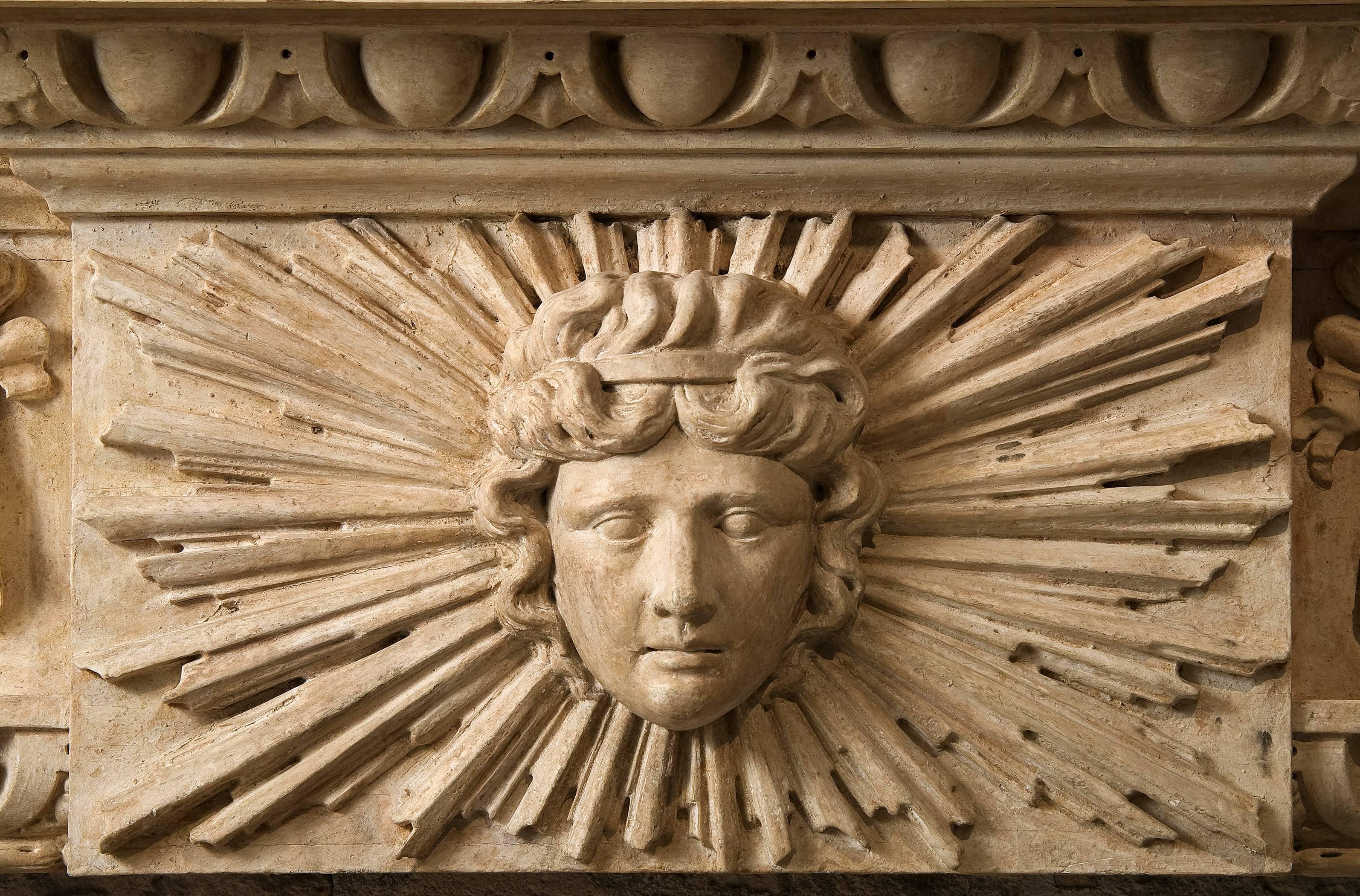 Fireplace in painted wood, 18th century style, circa 1745.
Richly carved by Henry Edmund Goodridge (1791-1894). The wood is carved substantially all-over mantel.
This fireplace is decorated with acanthus leaves and a big sun face on its shelf
