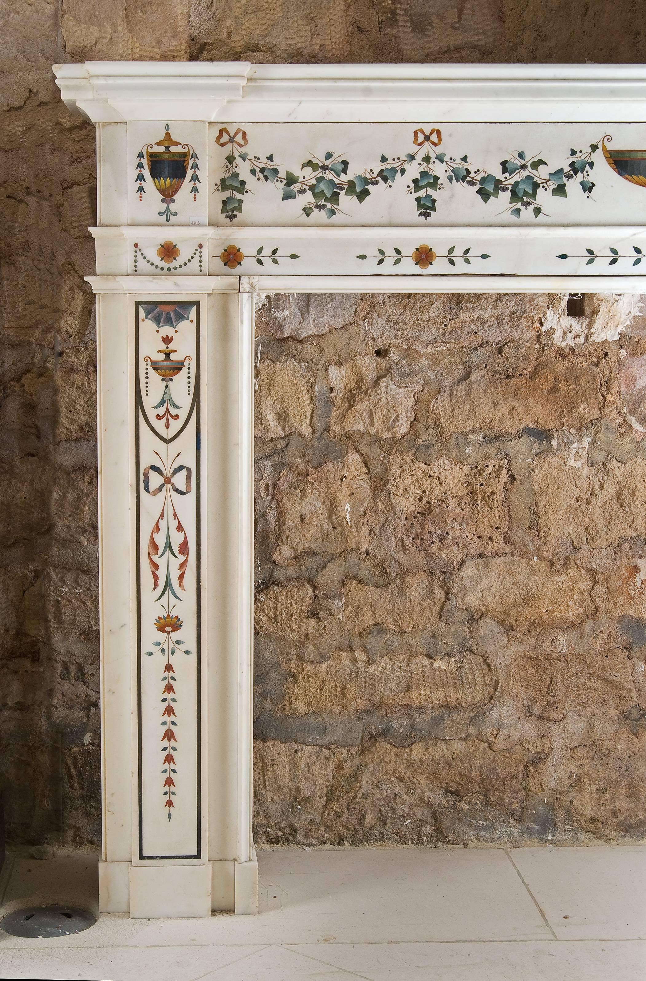 This beautiful and unique fireplace is in white marble with multicolor inlays from Pietro Bossi.
Its the specificity of the scagliola technic that makes this mantle a special piece of our collection.
This piece has all the hand marks of Bossi's