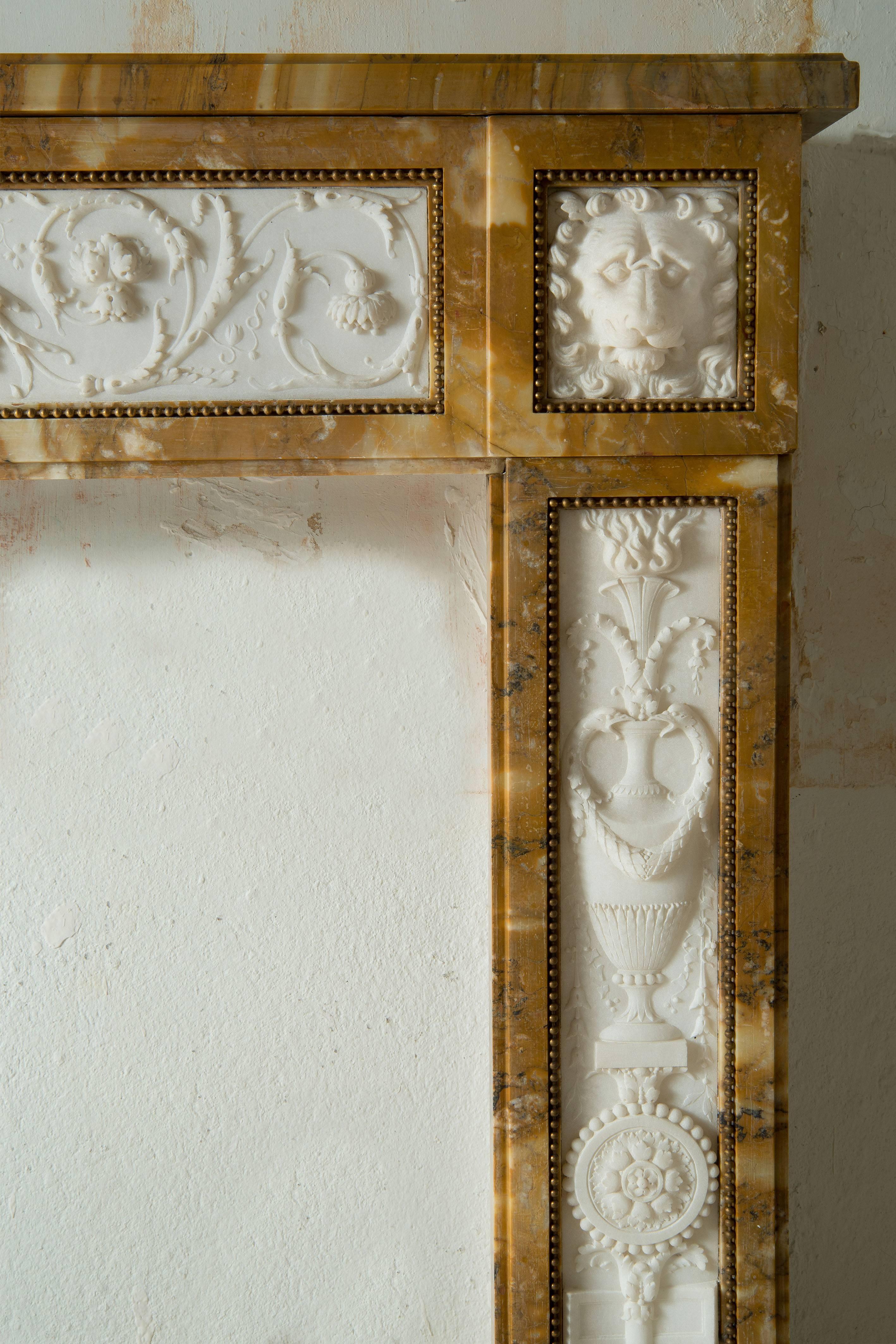 French A Louis XVI Style Yellow Marble Fireplace, 19th Century, circa 1803-1810 For Sale