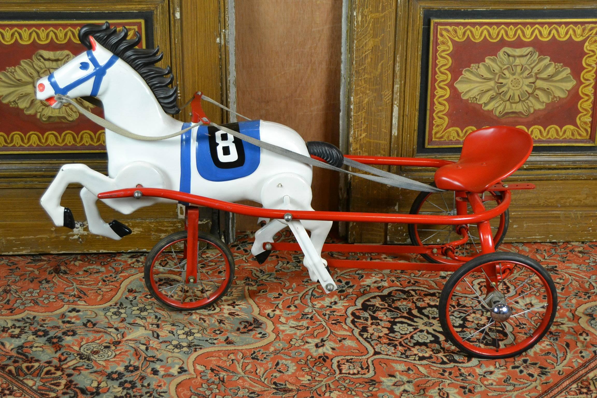 Midcentury Soviet, USSR toy,
Horse with sulky - pedal car toy - pedal car horse toy.
This child's ride sulky horse toy is numbered 8.
Vintage soviet metal tricycle toy, pedal toy complete with the manes and the tail in rubber!
As good as new