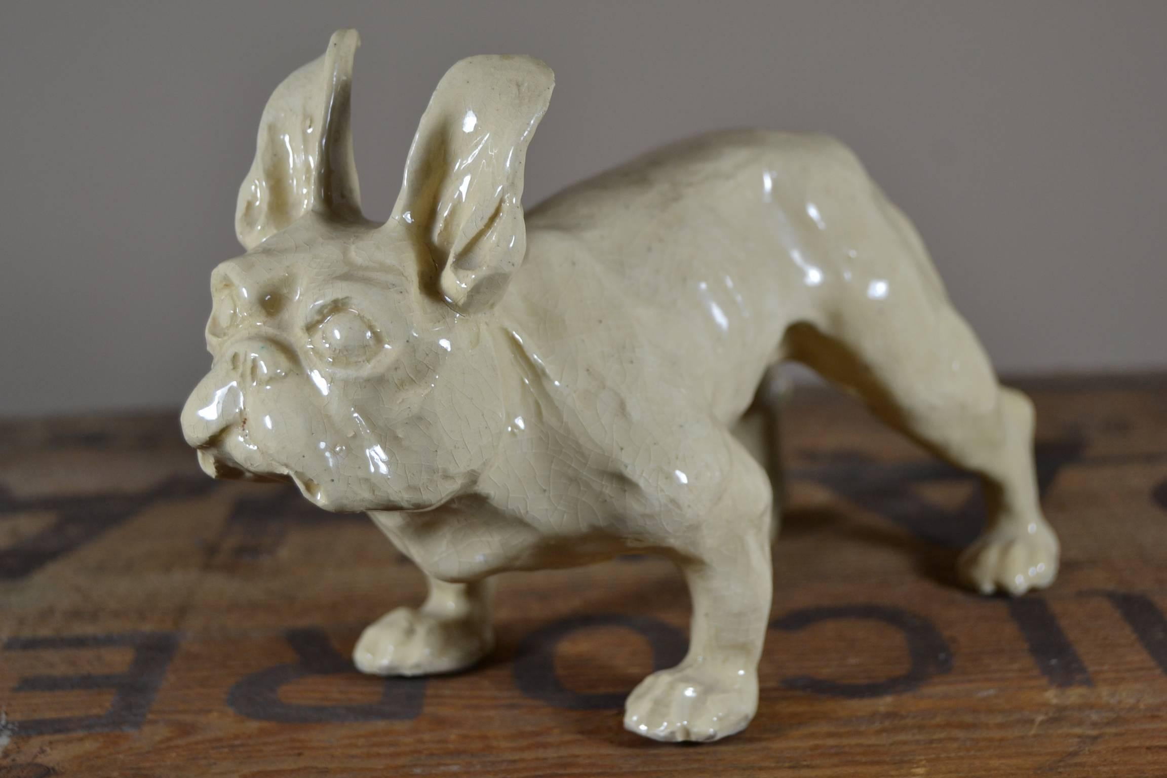 Art Deco Ceramic French Bulldog Sculpture. 
This French Bulldog sculpture is great by his design: a strong tough dog.
This Frenchie Figurine does have some craquelé by age, but that is charming. 

Bulldog - French Bulldog - Frenchie - 
