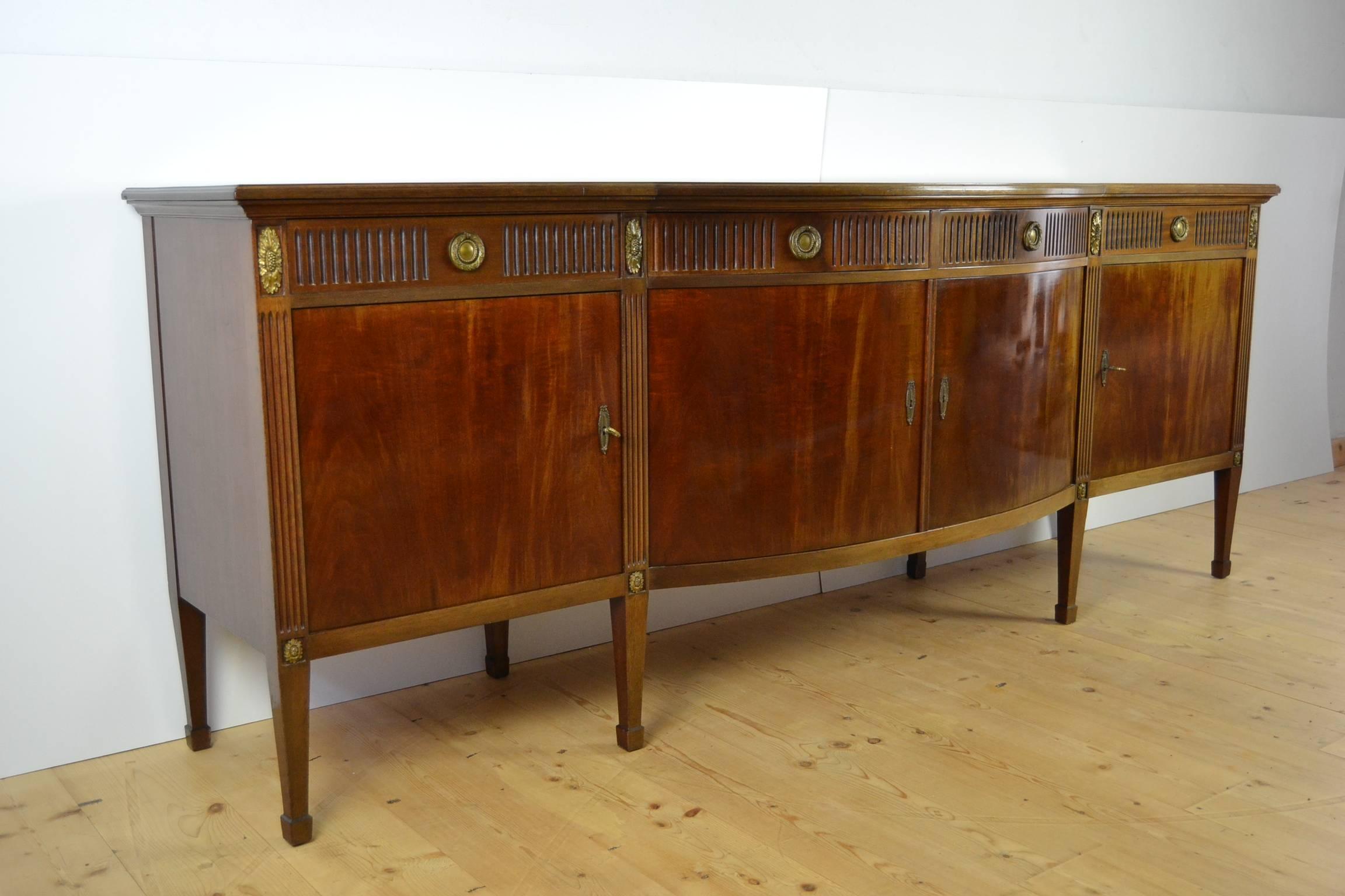 Beautiful large credenza sideboard commode Louis XVI style made in the manner of Jansen. 
Nice details with cast bronze hardware and beautiful rounded shape.