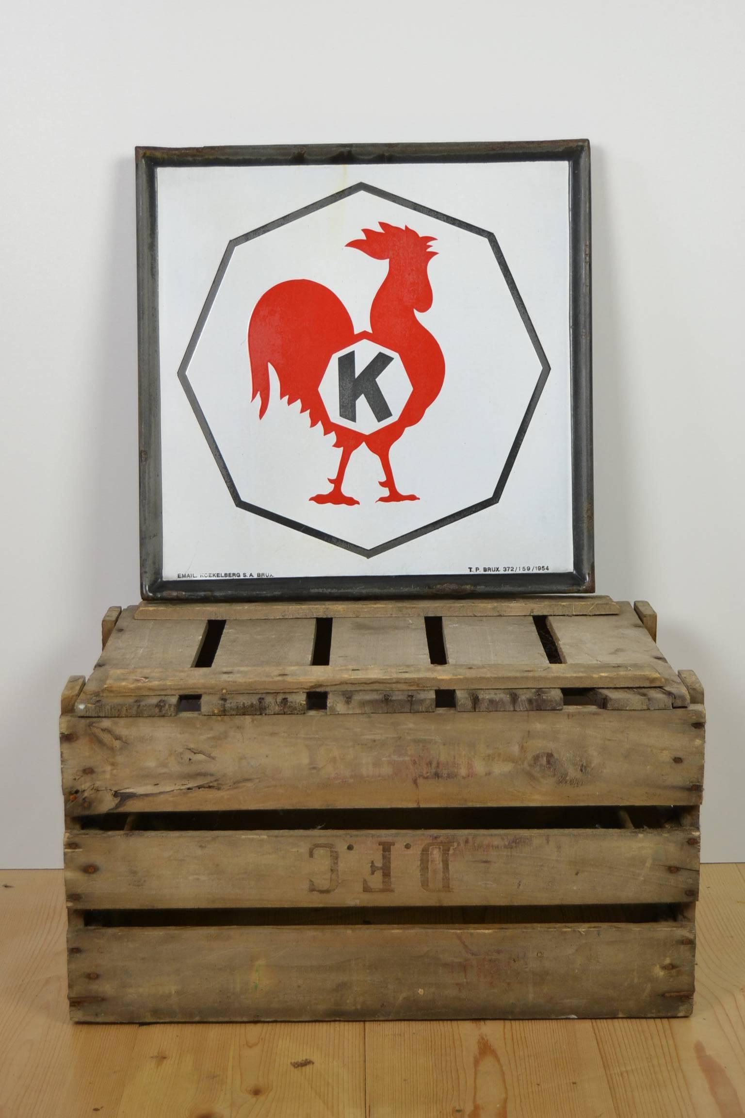 Exceptional enamel sign, retro wall decoration, interior idea
for home, kitchen, restaurant business.
Square white enamel sign with red rooster- cock. 
Made by Emaillerie Koekelberg, Brussels, taxes paid in 1954.
  