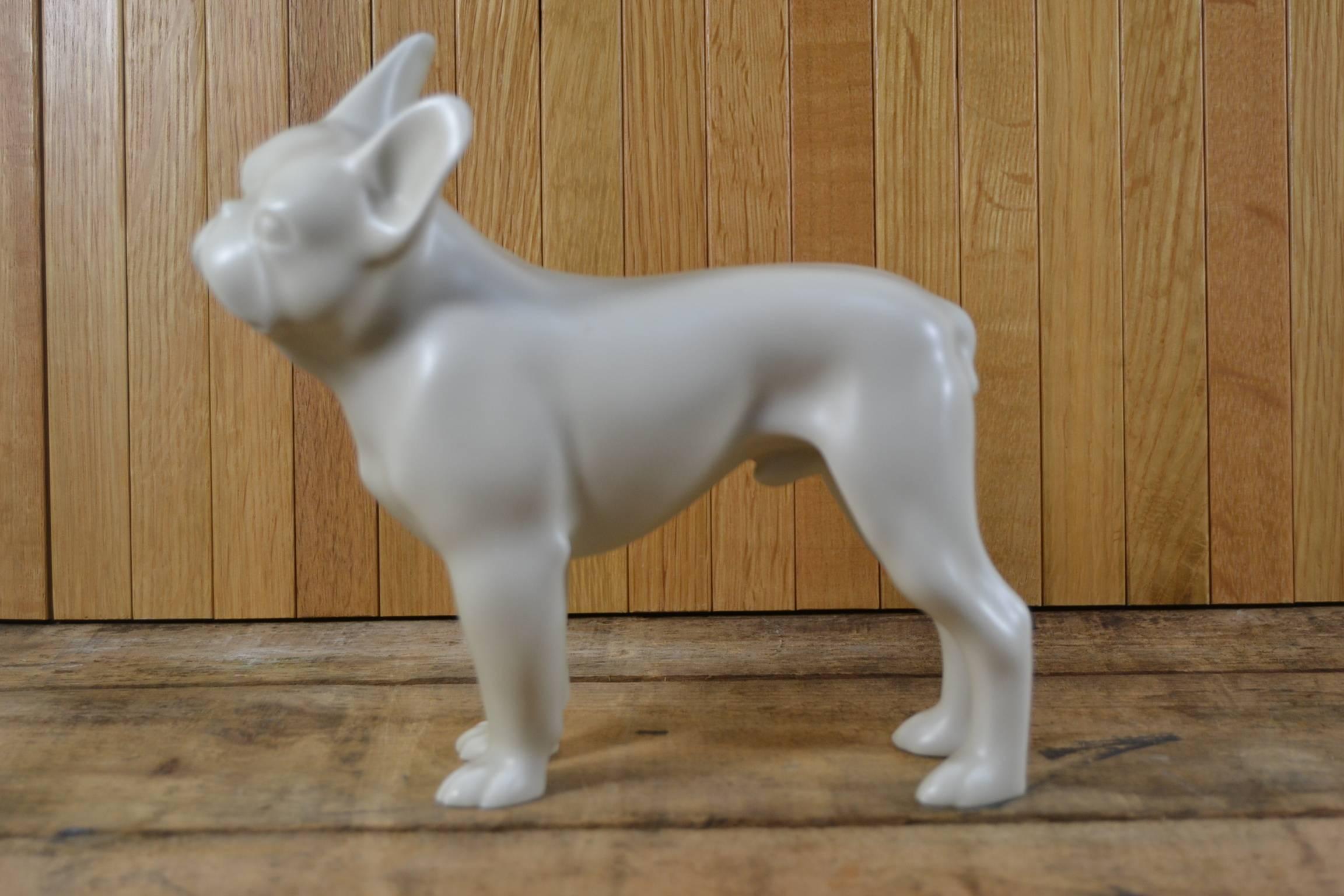 Superb rare Art Deco matte white porcelain French Bulldog, Frenchie.
Made by B&G, Bing & Grondahl, Denmark, 1930. 
French bulldog collectible from Denmark, Franske Bulldogs. 
With stamp and number 2165/11.
Original old sculpture, that for that