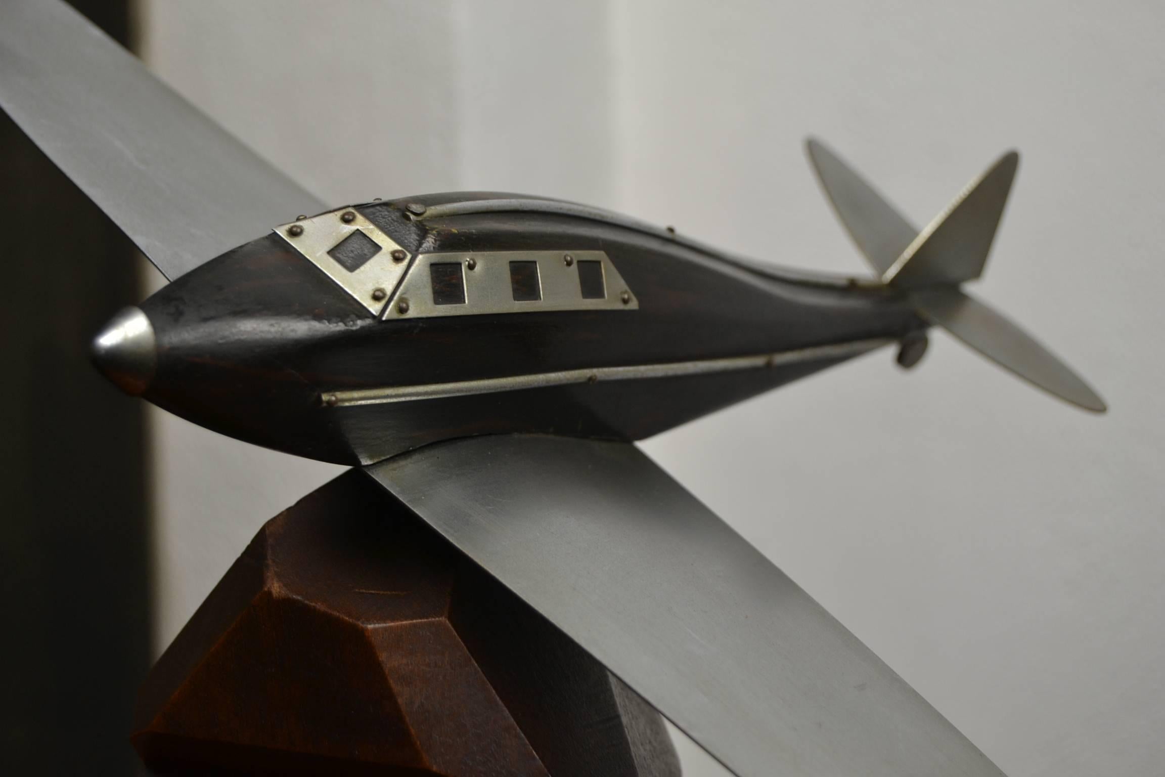 Stunning airplane model-that special desk ornament.
Wooden plane model with metal details, wings and tale. 
Art Deco period, circa 1930-1940.

  