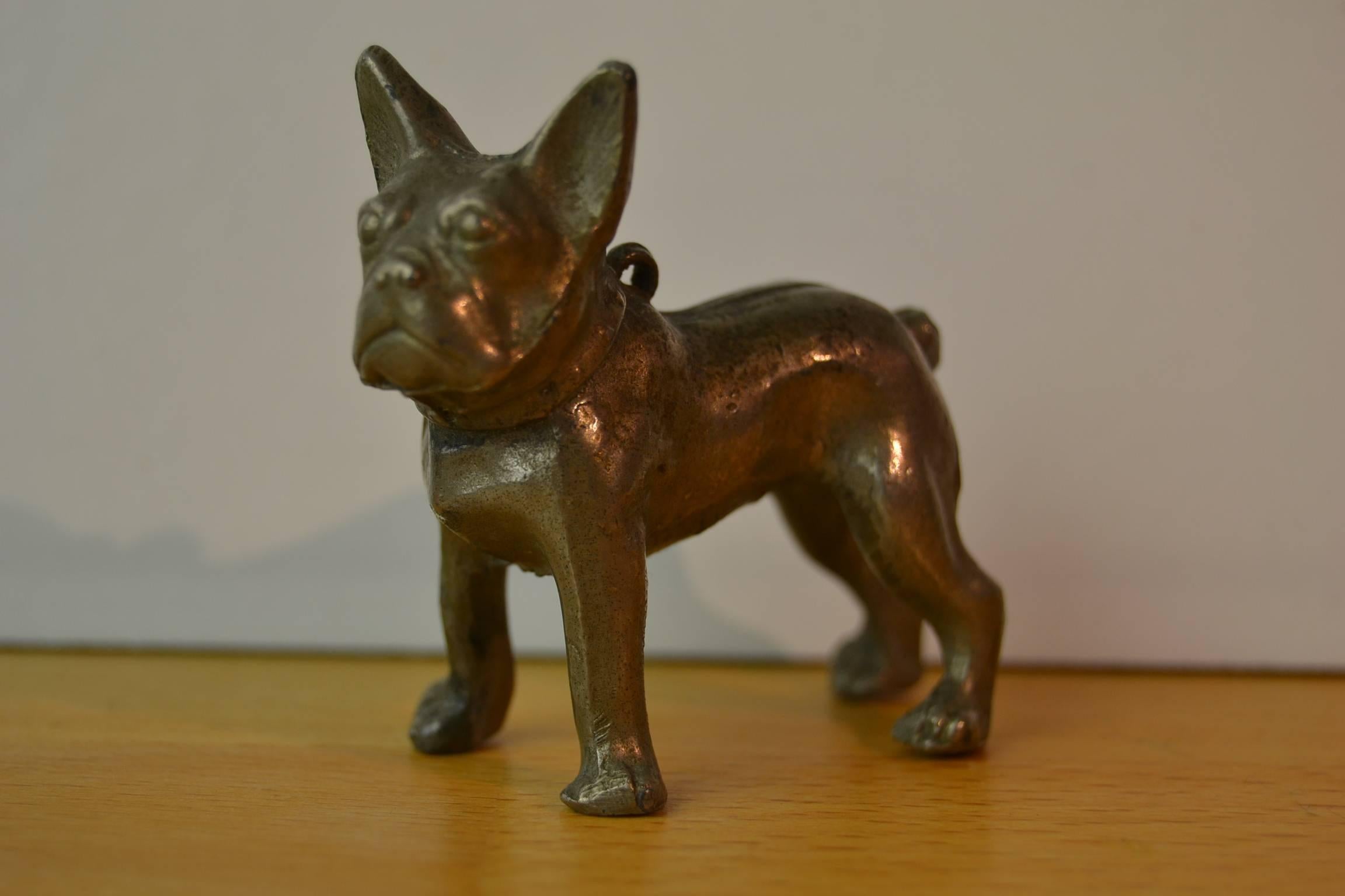 Lovely Old very detailed metal French bulldog - miniature figurine - pendant.
Marked: Made in Japan, stamped on the bottom side.
Little statue made from heavy pewter metal.