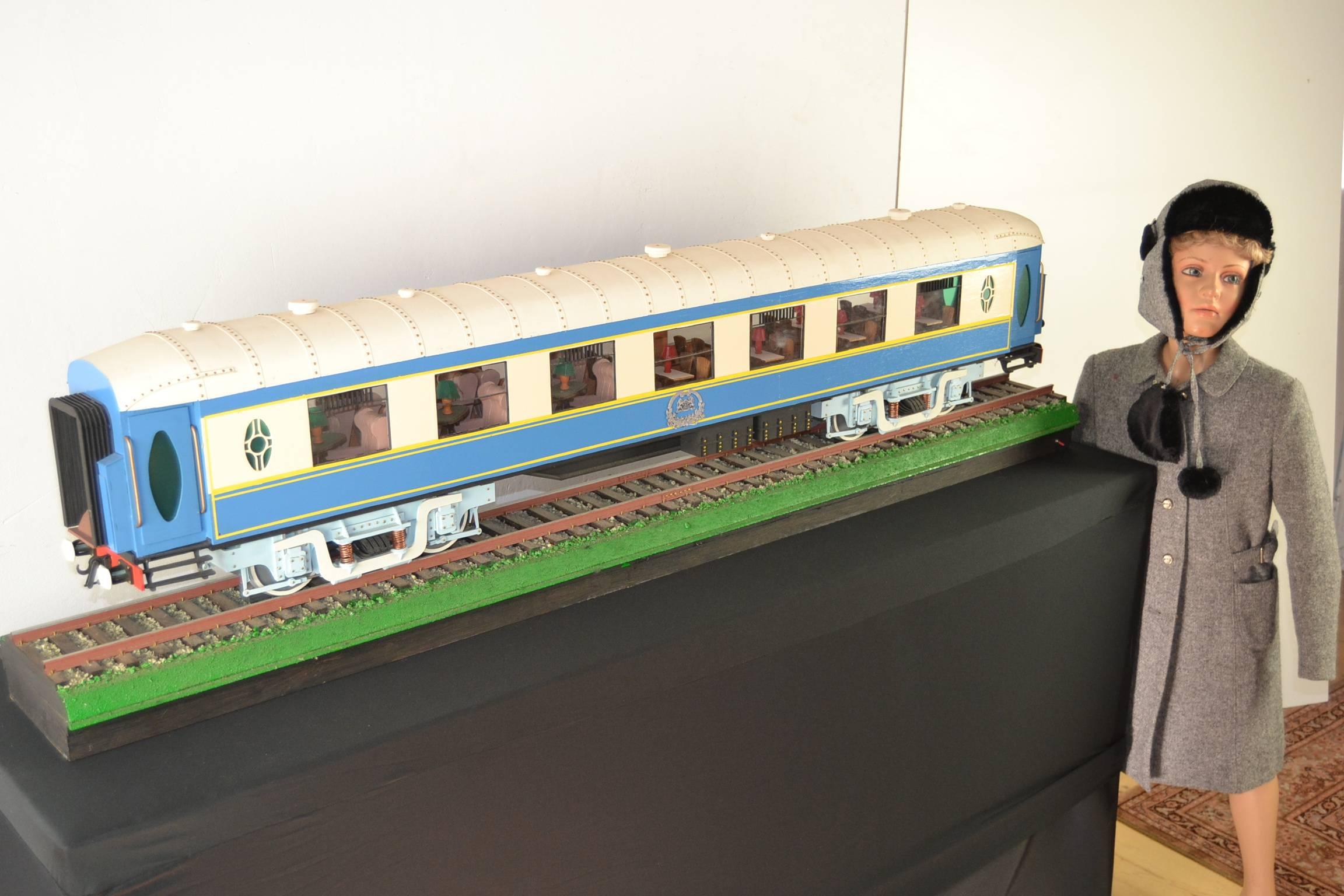 Large  model  of the Orient Express Luxury Train : 66.92 inch x 170 cm  ! 
Known as the hotel on wheels.
This large-scale model is very detailed and also lights inside. 
It was made by a French passionate train lover many years ago.
Pictures speak