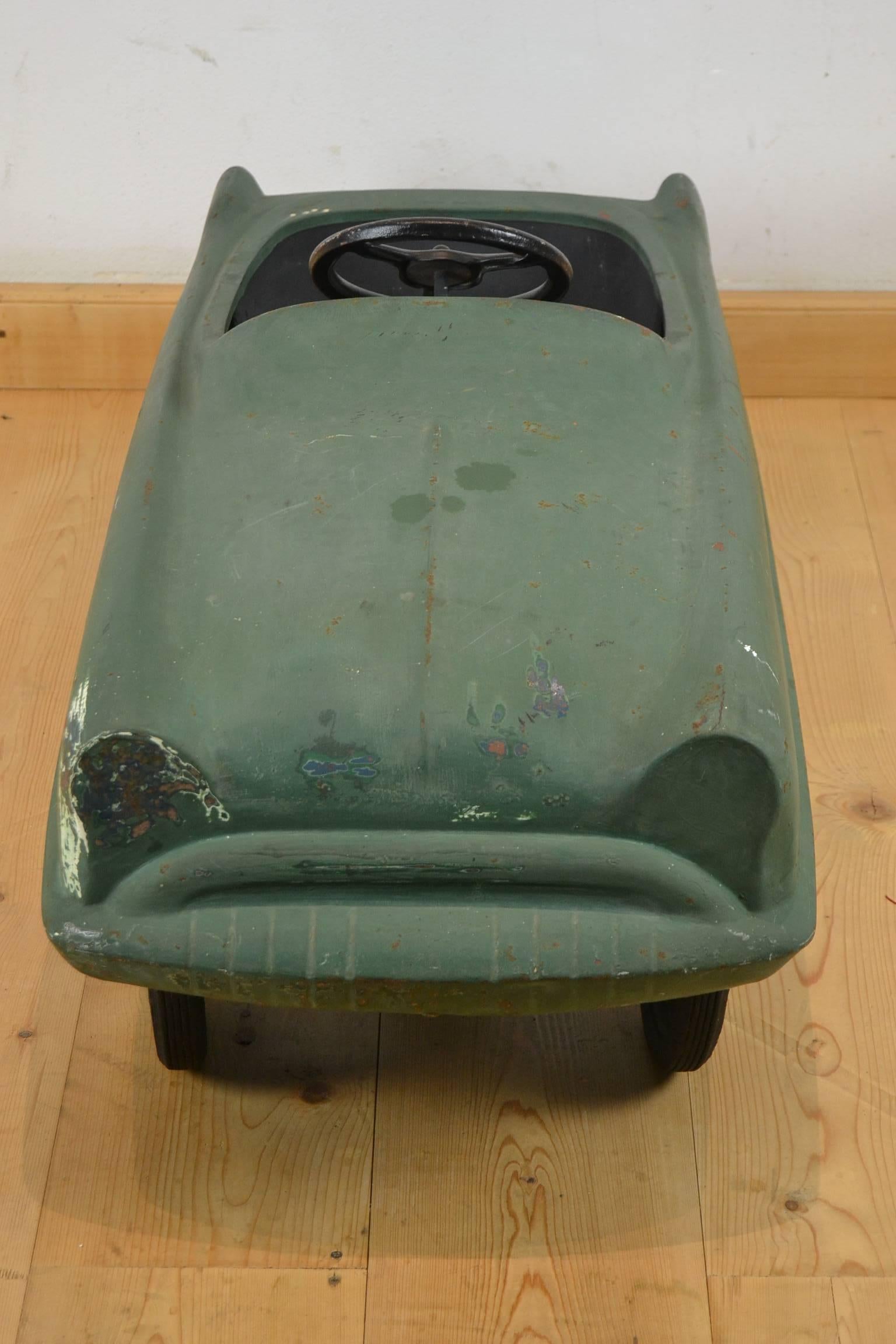 Vintage Toy Car - Pedal Car made by the Garton Toy Company USA. 
This Kidillac Pedal Toy Car was made in the fifties.
It's a very strong steel body with solid rubber tires , chain driven. 

Nostalgic toys - Vintage pedal cars - metal pedal car -