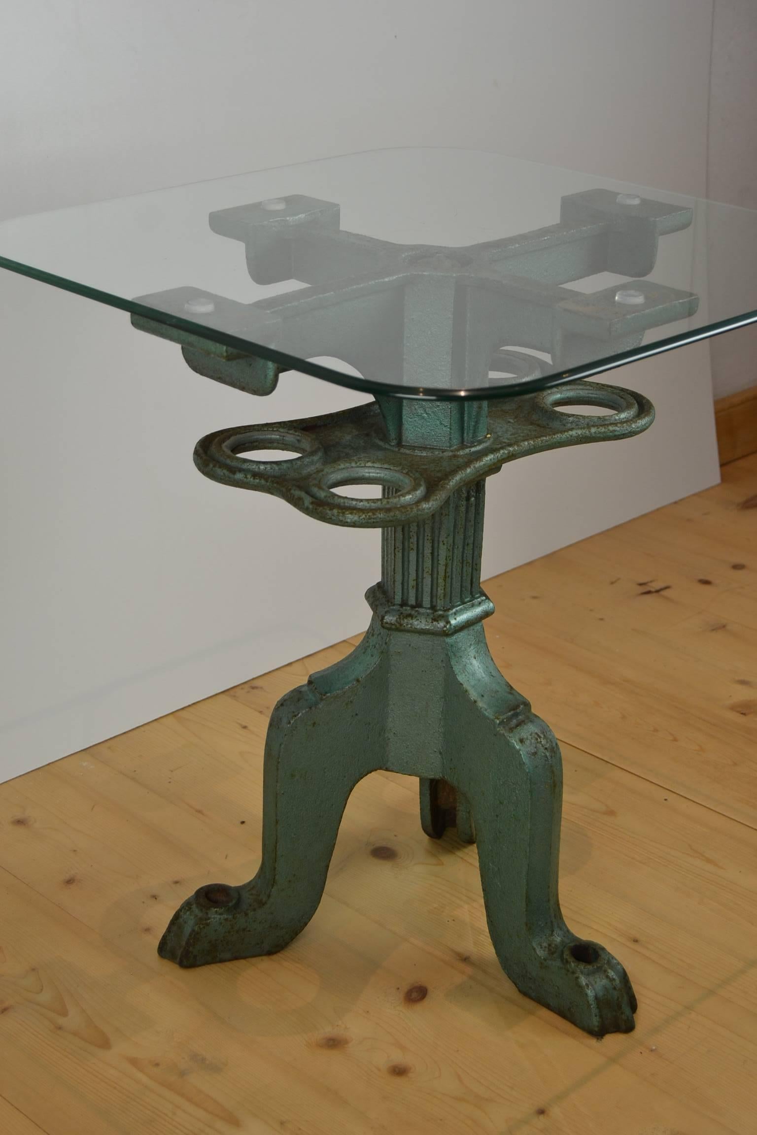Side table, antique Industrial base, circa 1930 with square vintage glass top.
The cast iron base has a beautiful shape and has his original green colored hammering paint with a great old patina.
The glass table top is used so little