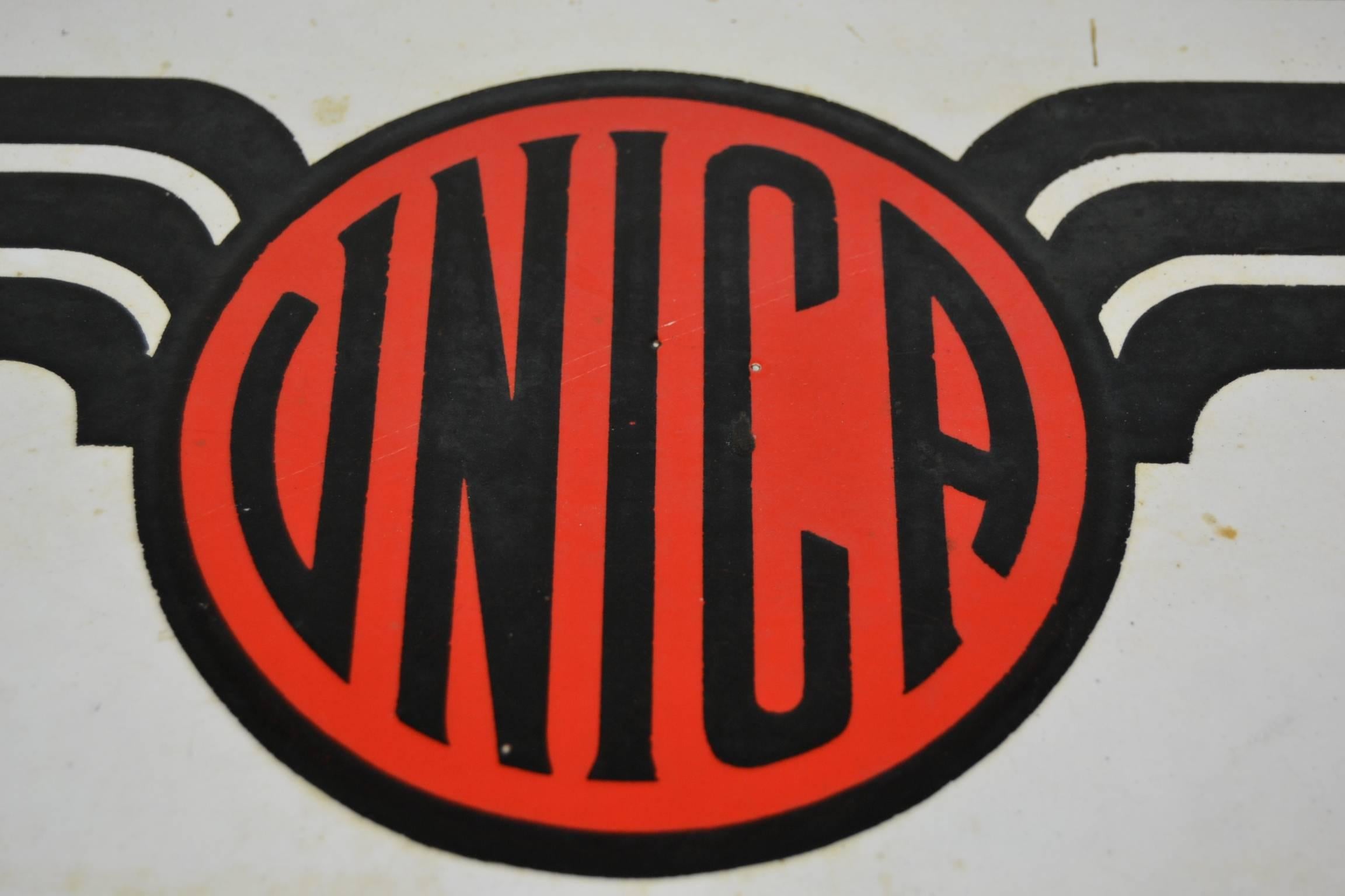 Vintage enamel sign for workshop Unica Brussels, Jette (Belgium)
This square enameled metal sign from 1947 has a beautiful design and use of letters
and is made by the Company Foremail - Bruxelles - Brussels.
Combination red, blue and