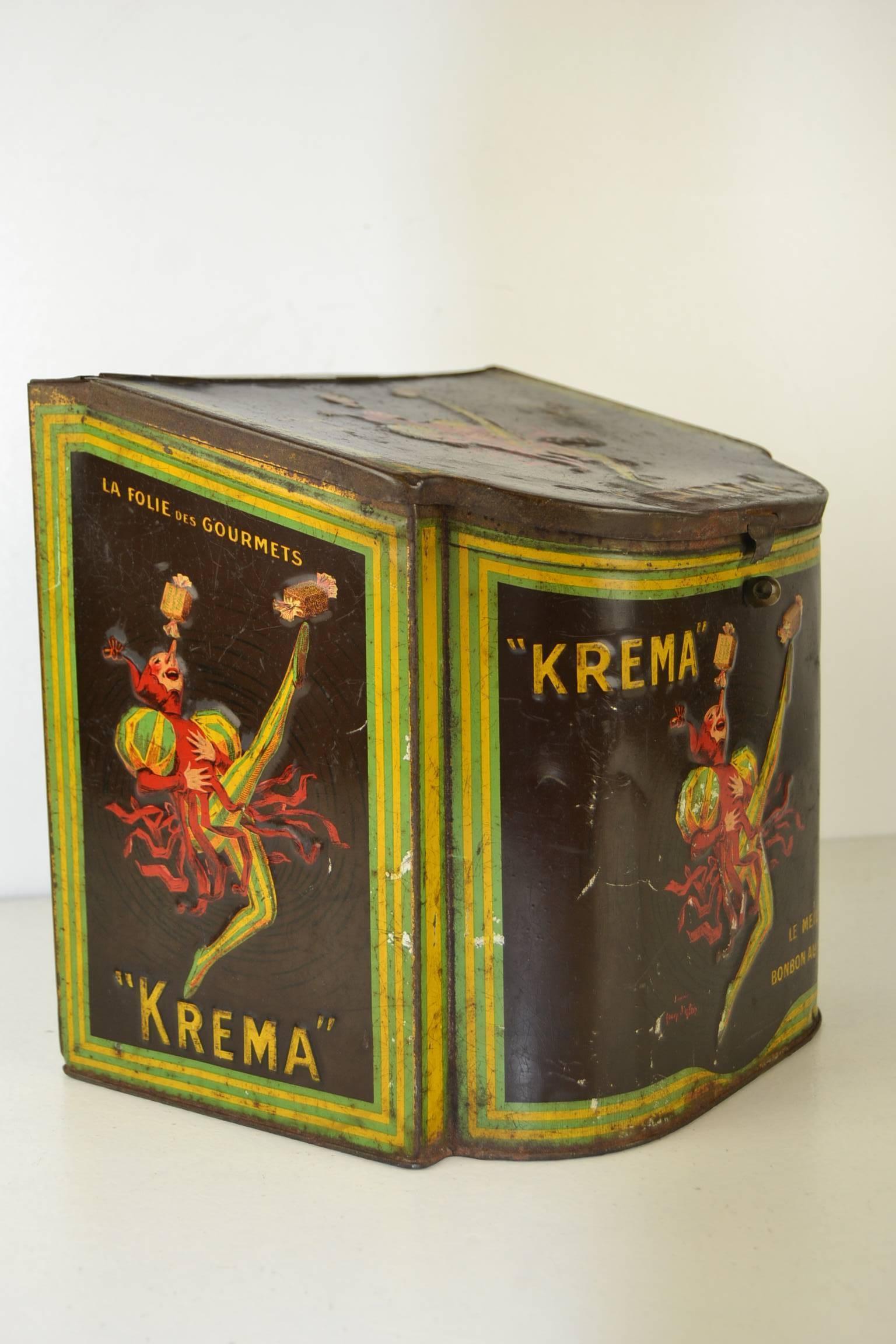 Jean D' Ylen designed and signed Confectionery Tin with Jester for Krema Bonbons 1