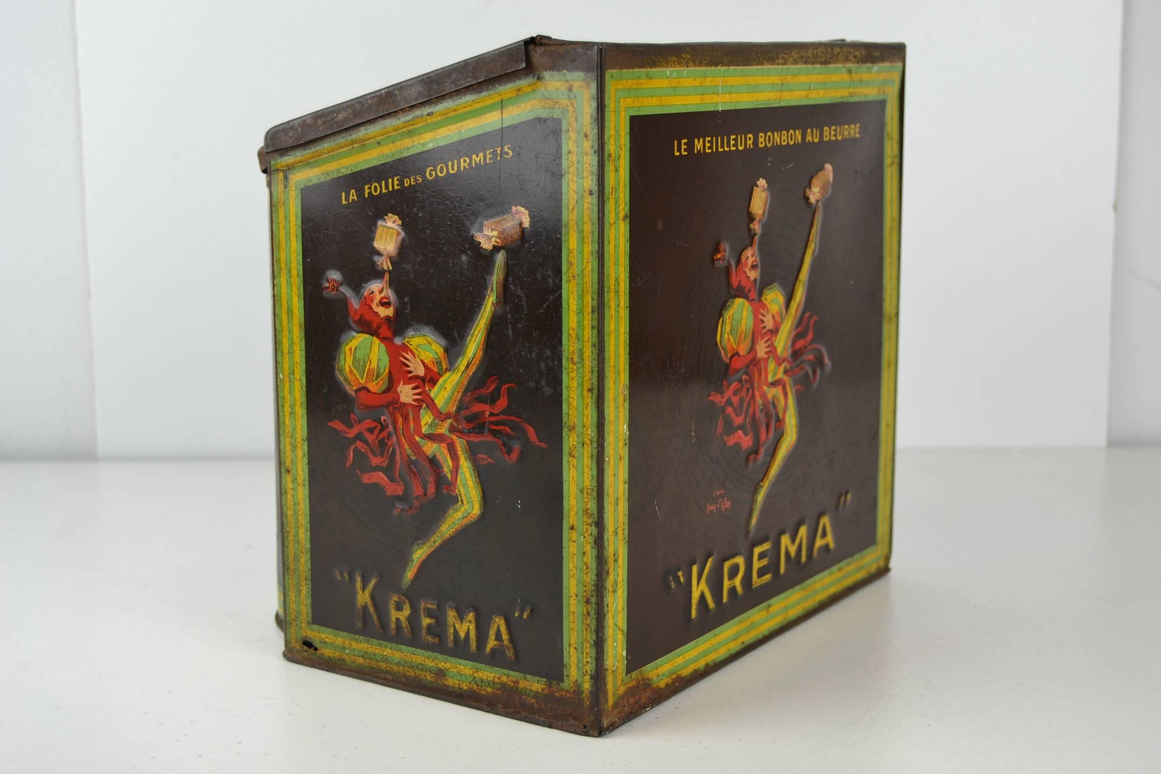 Art Nouveau Jean D' Ylen designed and signed Confectionery Tin with Jester for Krema Bonbons