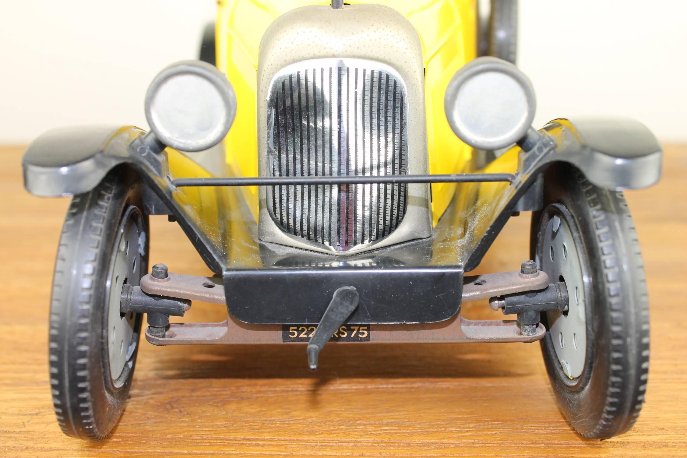 Vintage Large Citroen 5HP Torpedo - Tresle Toy Car with boat tail. 
Re- issue model made by  Marco France Toys in the 1970s, 
the model without a motor.
The body of this Citroen Convertible Car is made of tin;  the baseplate , running board,