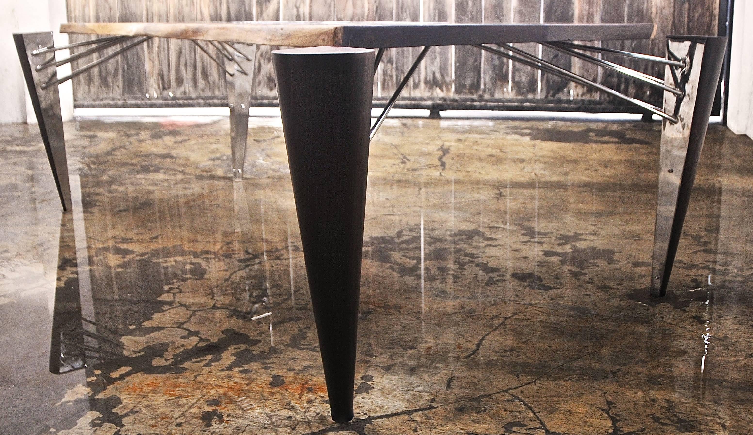 Rocket table
designed by Bruno Helgen and manufactured in his workshop in Bali.
Signed: Helgen Design/Stamped: R/2015.
Time process: June to August 2015.
Feet: Stainless steel 304 5 mm/finishing: Mirror polished.
Top: Rosewood from East Java
