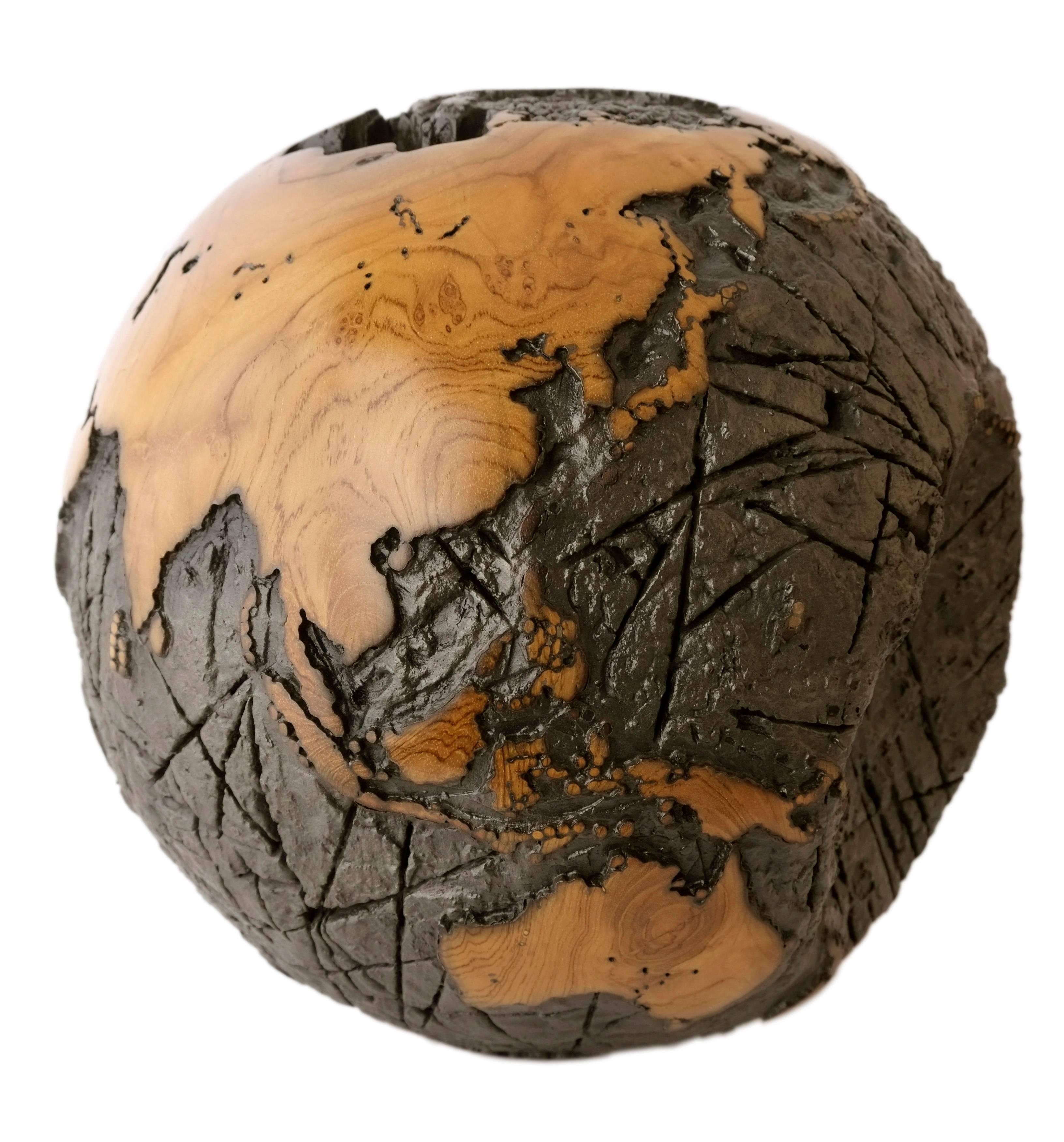 Balinese Wooden globe made of teak root and metal with cold lava flow texture, 30 cm