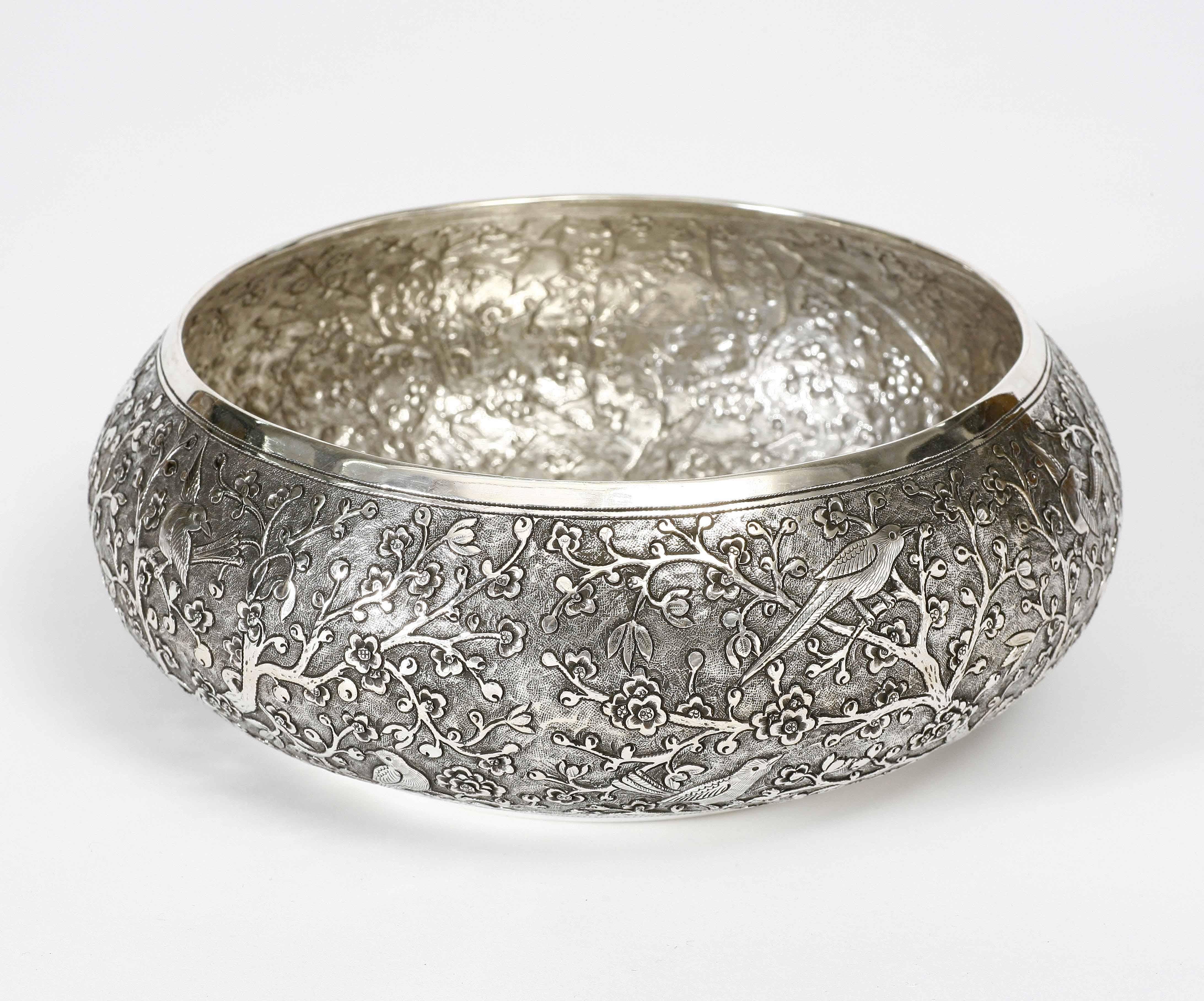 The fine solid silver bowl is chased with meticulous motif of blossom and birds. The bowl is available in other sizes.
The silver is 90% pure.