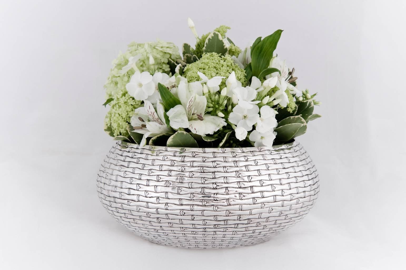 A contemporary solid silver bowl, finely chased with
bamboo motif
The silver is 90% pure.