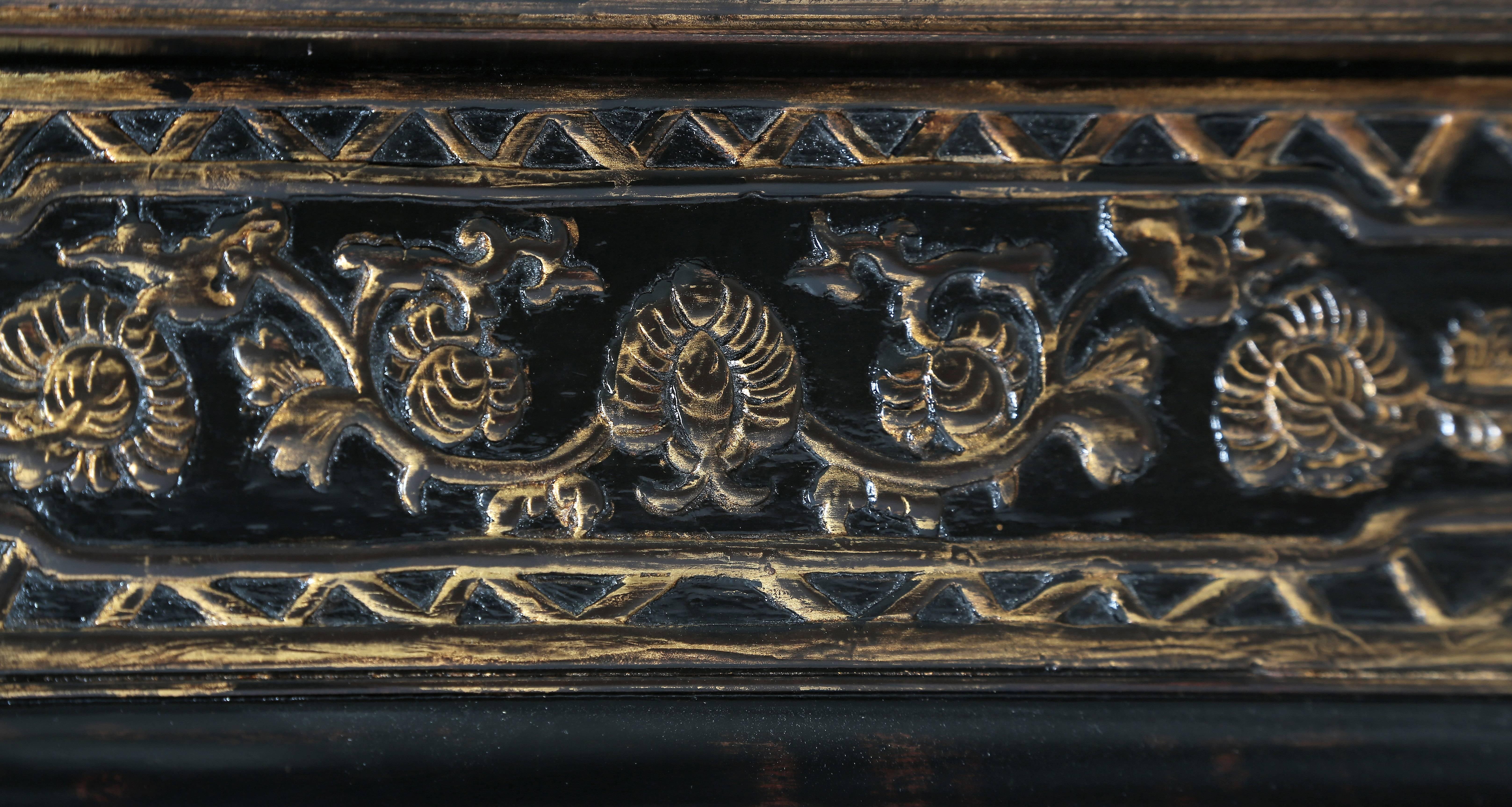 Qing 19th Century Chinoiserie Cabinet, Black Lacquer with Gilt Relief-Carved Motifs For Sale