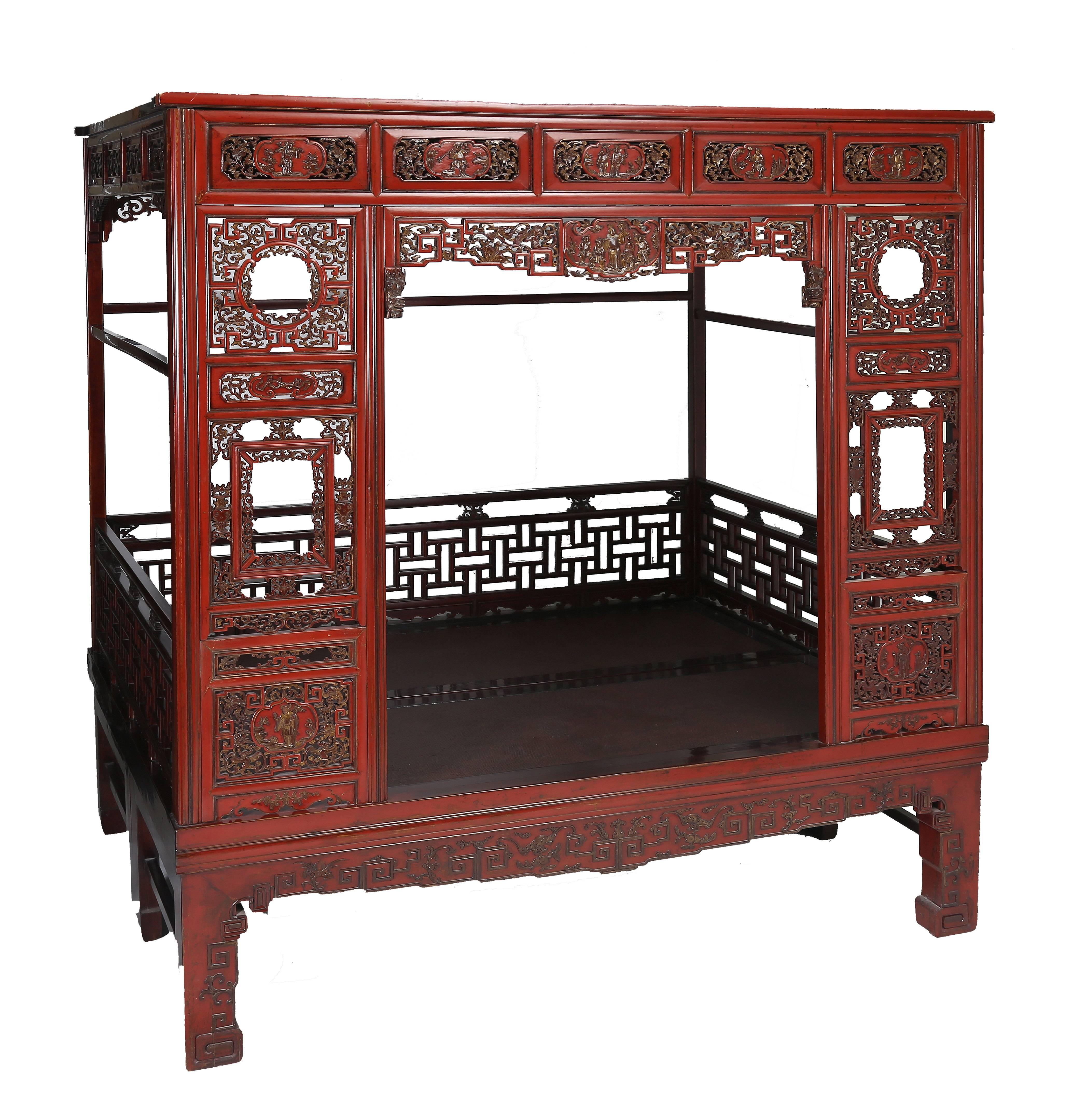 The double bed bases joint in the middle as one, the frames enclosing the hard cane top, aprons and feet relief-carved with lingzhi, bats, peaches, ruyi cloud, floral foliage and reticulated scroll work; four posts forming the frame for the lattice