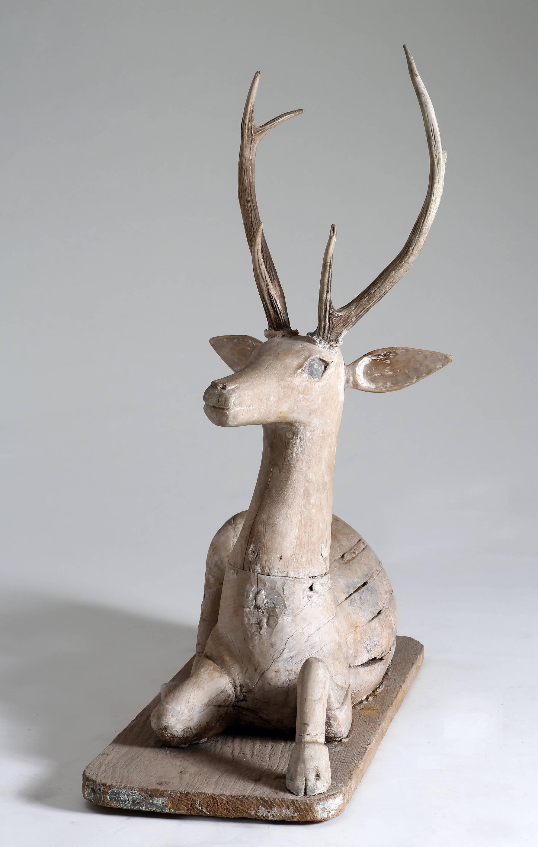 sitting deer statue