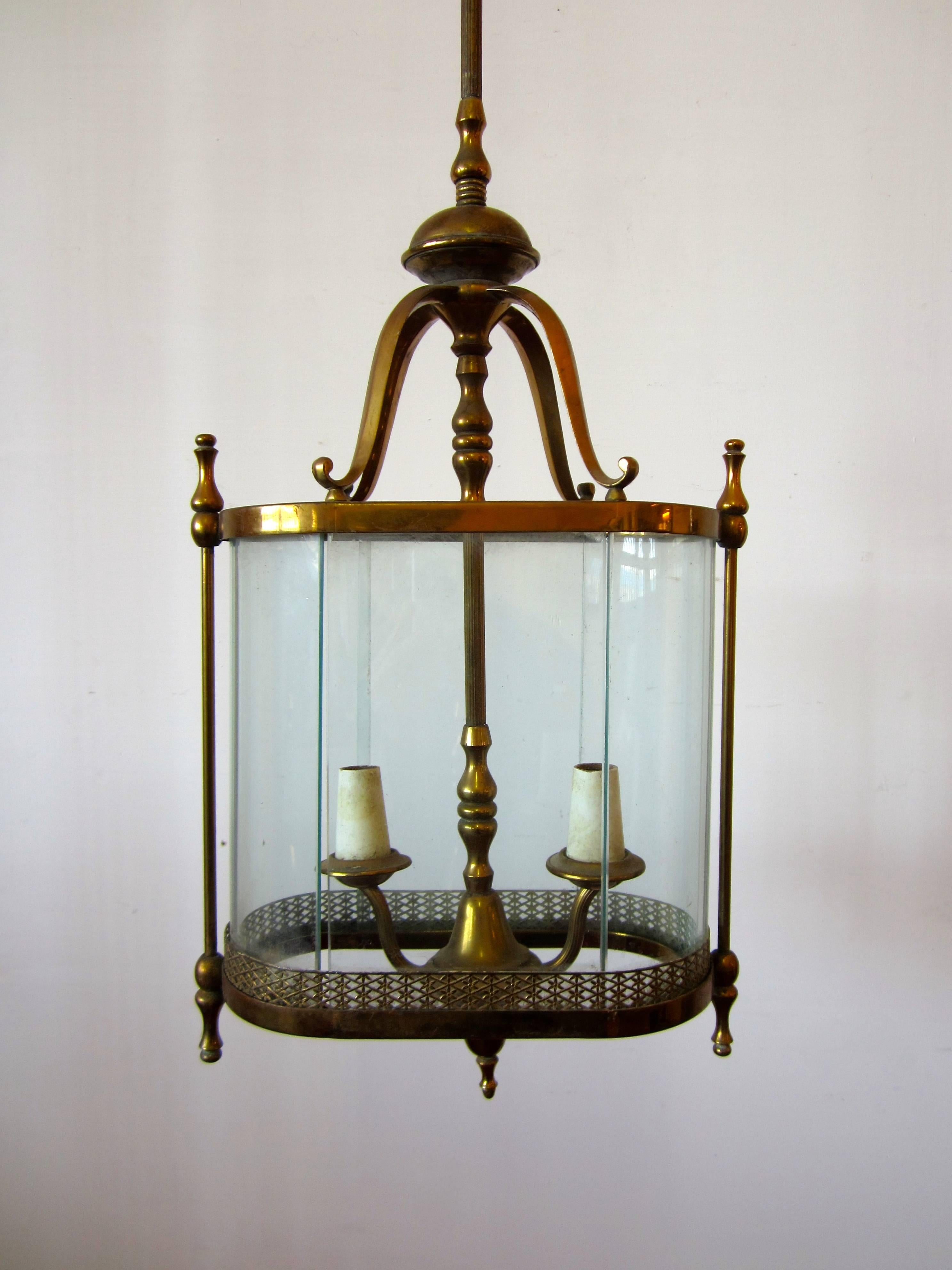 A mid-20th century brass lantern with glass.