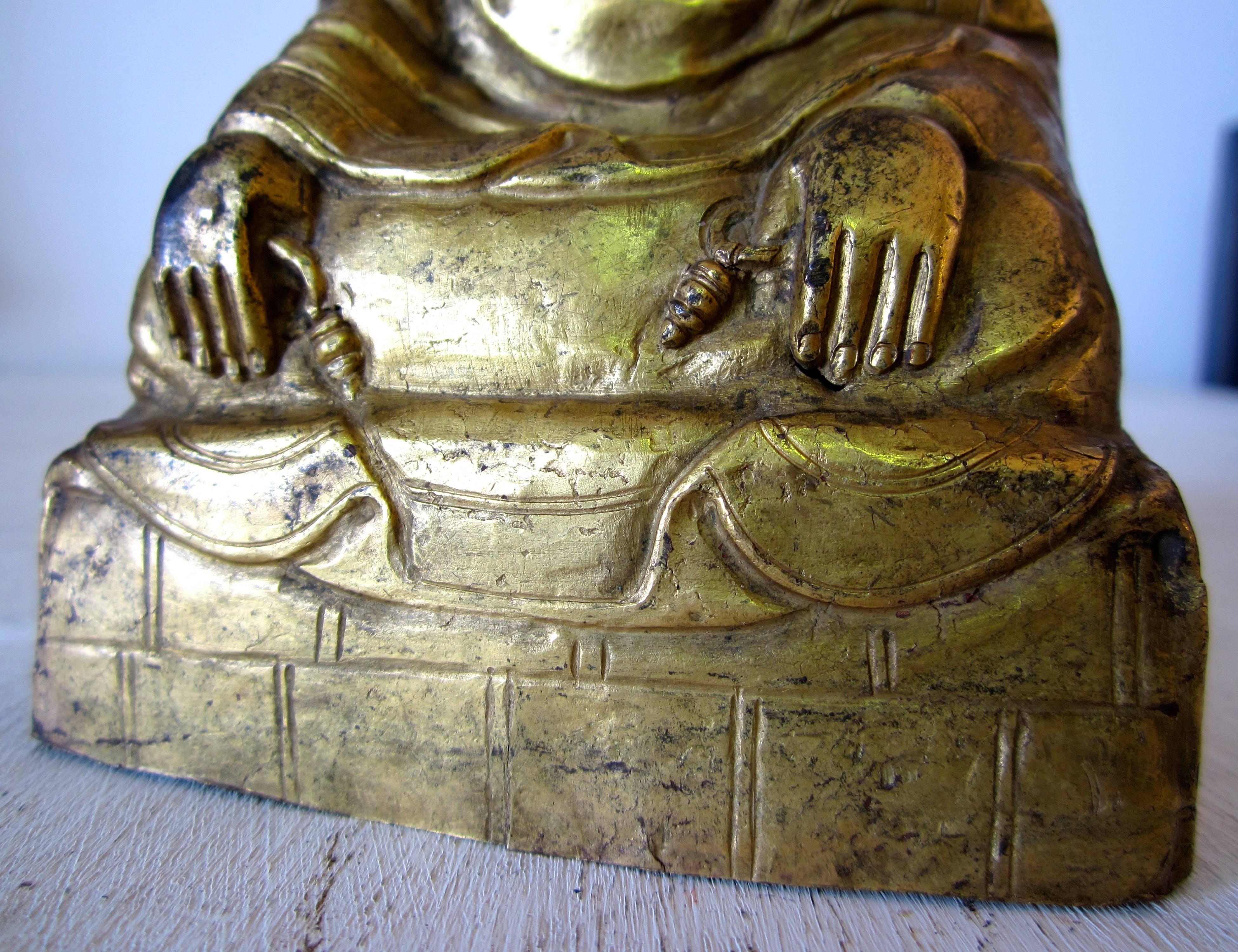 Tibetan Gilt Copper Repousse Figure of an Arhat In Good Condition In Fossano, IT