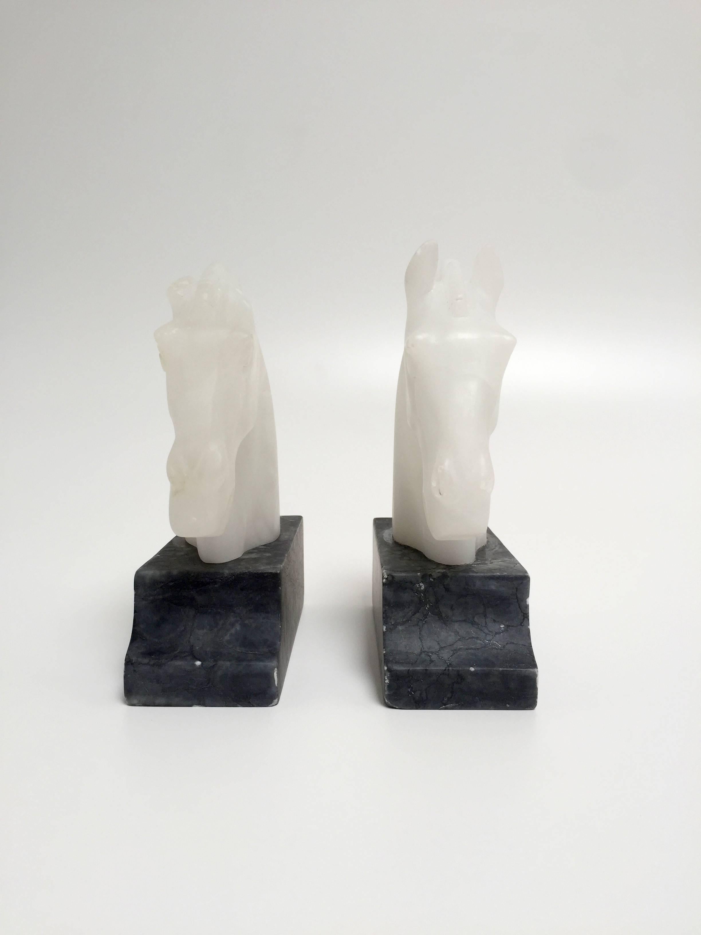 Lovely vintage pair of alabaster and dark stone horse head bookends.