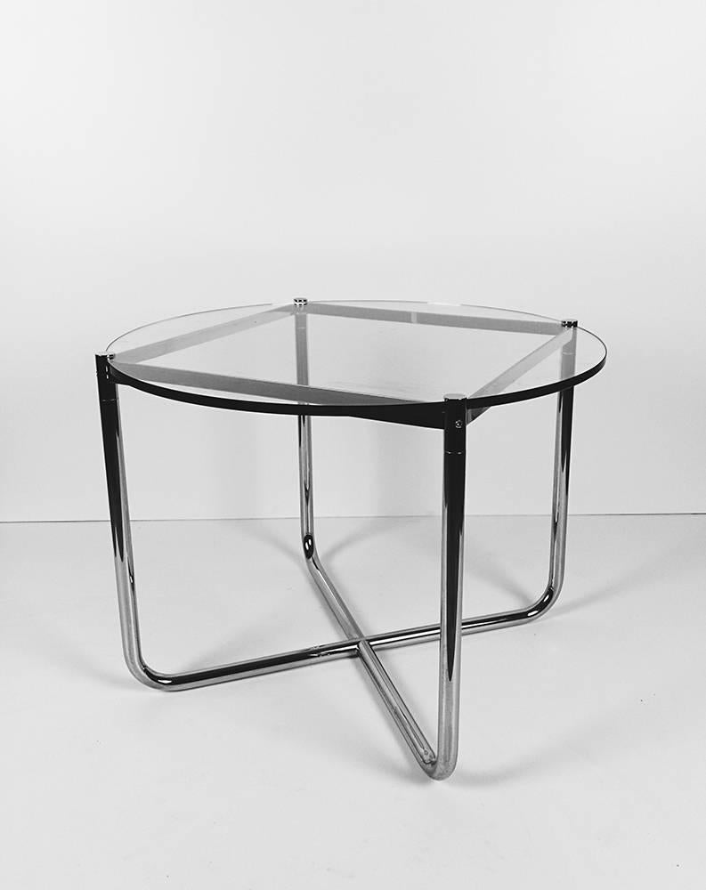 Minimalist round chrome and glass side table, designed by Ludwig Mies van der Rohe in 1927 for the Tugendhat House.