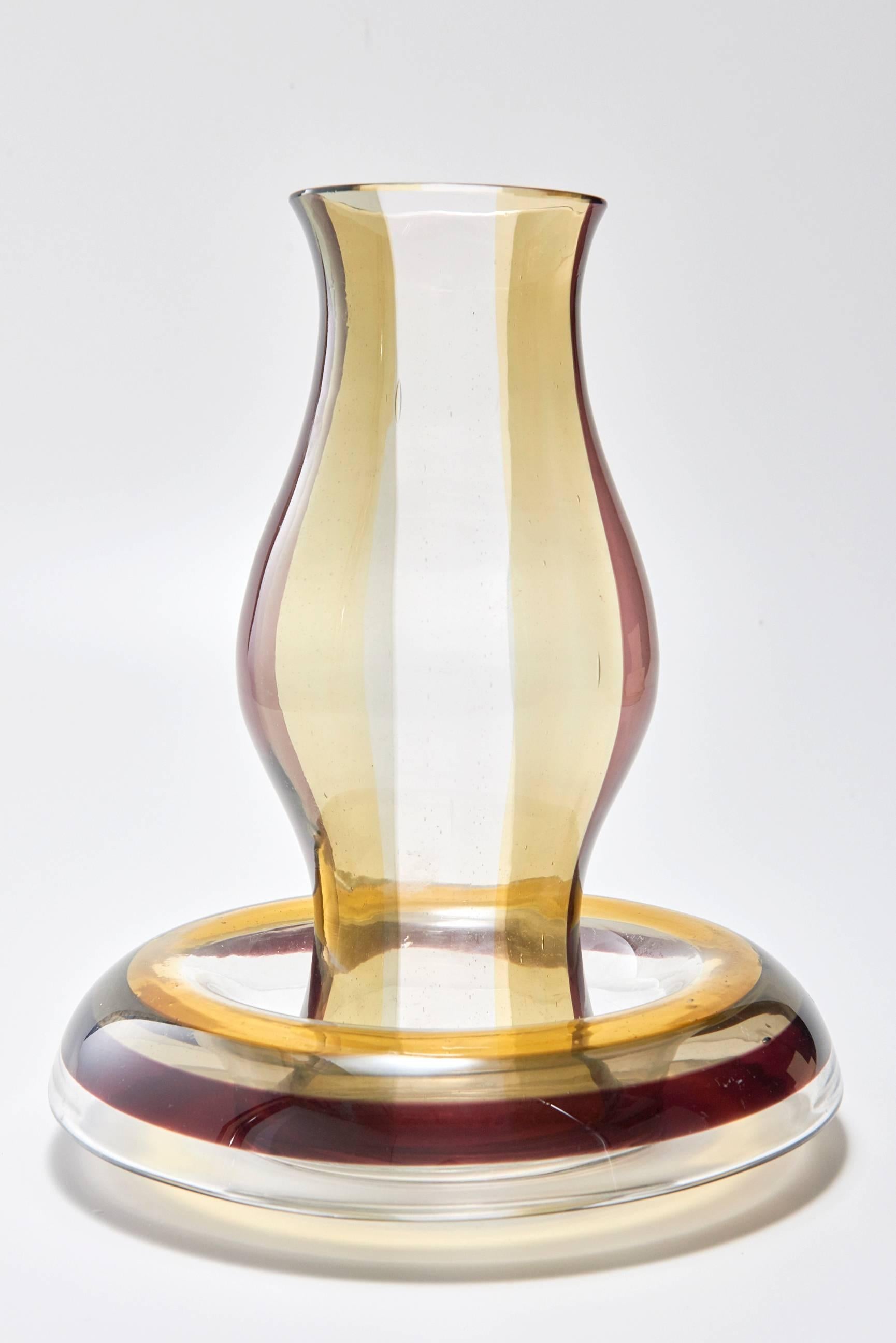 Rare 'A Fasche' hurricane lamp with original candleholder, designed by Italian master Fulvio Bianconi for the legendary Murano glassmaker Venini in the 1950s.

Rarely seen with the original holder, this piece is in excellent condition, with only