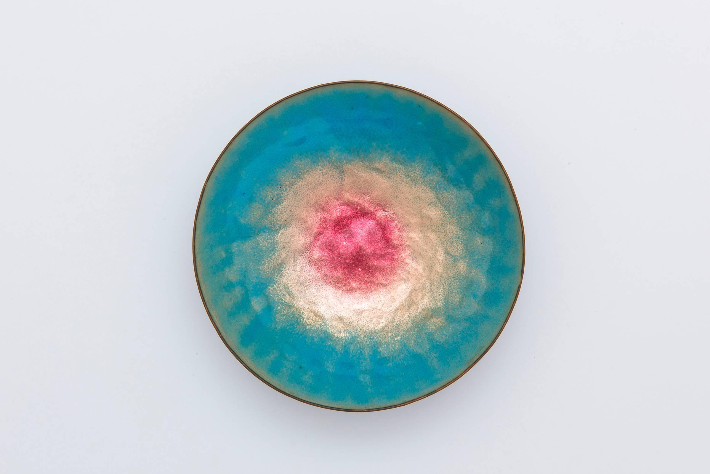 Bowl by Italian master of enamel Paolo De Poli. Excellent coloring ranges from pink to gold to turquoise. Outside of bowl is a royal blue. Signed to underside.