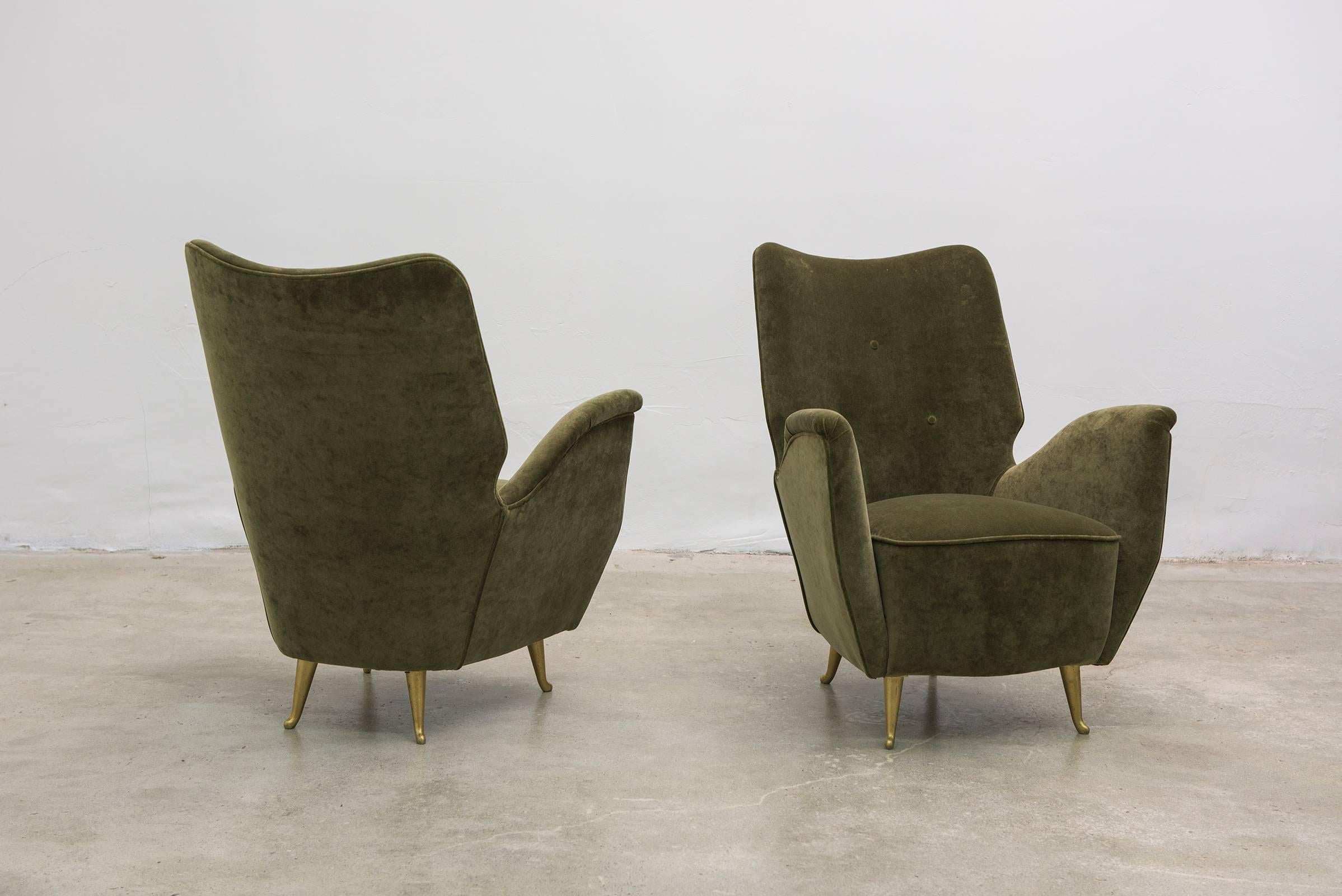 Vintage Pair of Italian Modern Salon Armchairs by Arredamenti ISA, 1940s. Gorgeous pair of petite armchairs by Arredamenti ISA, Bergamo, Italy with sculpted back and slightly winged arms. Reupholstered in sage green velvet with gilt metal legs.