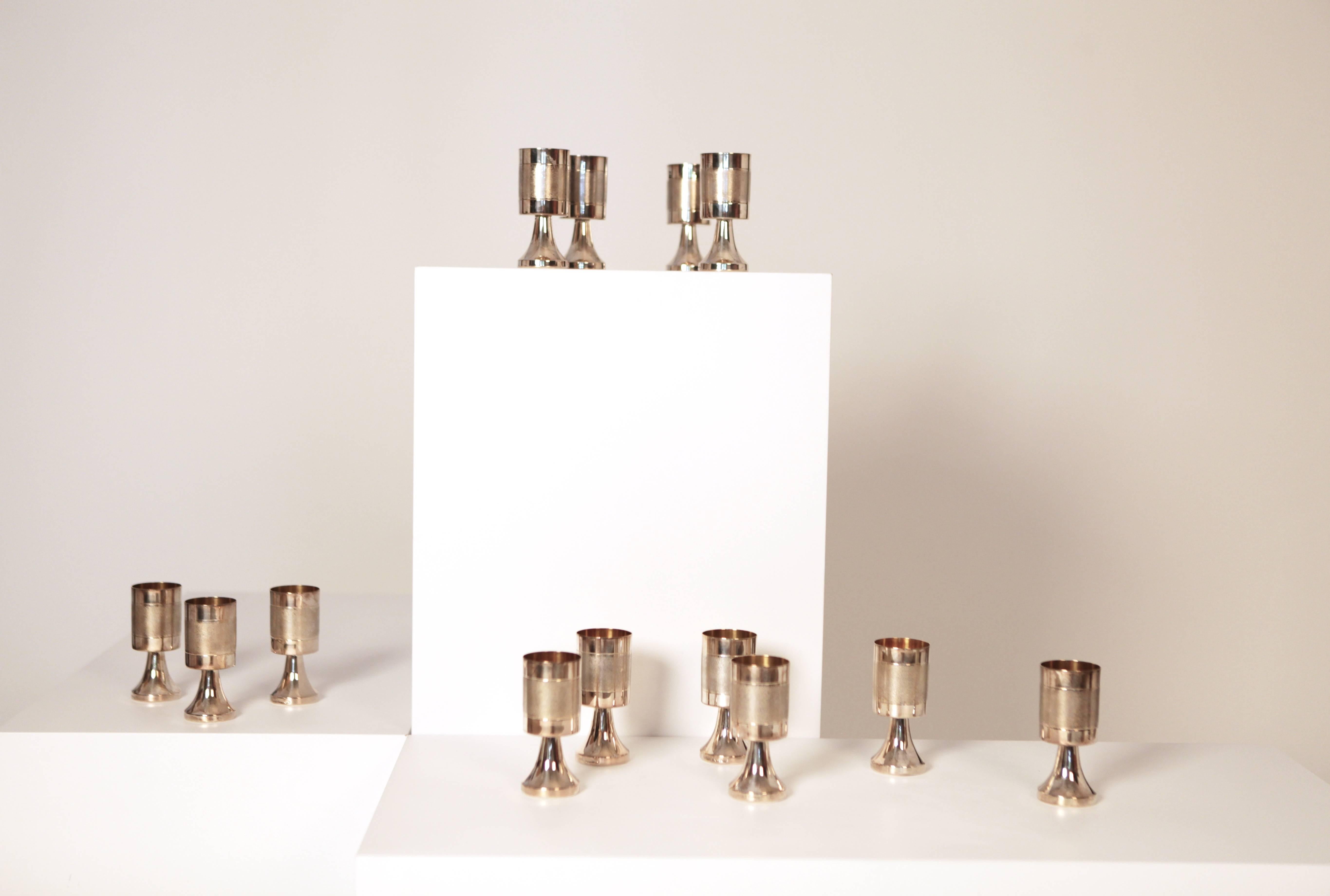 A set of 13 gilded and sterling silver champagne or wine cups.
manufactured in1978 for Alton, Falköping, Sweden.
approximate, 1700gr.
stamped.