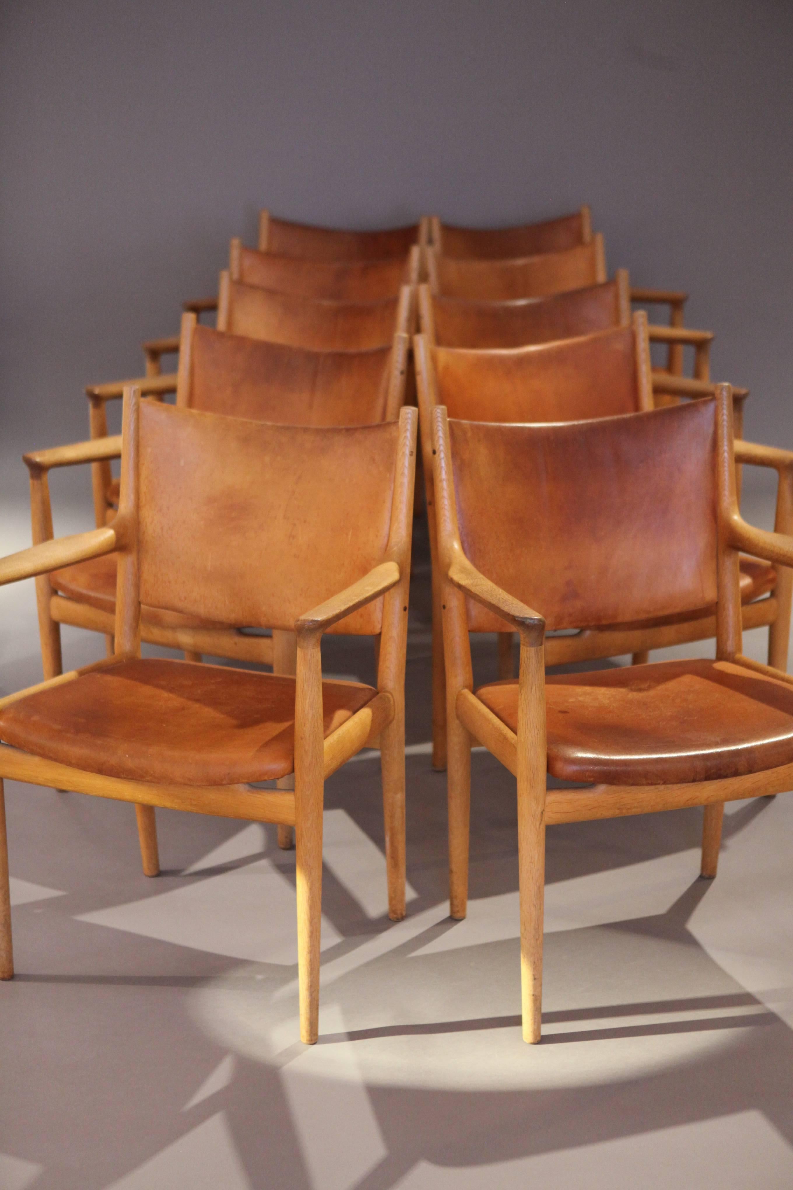 Hans Wegner JH-713 Oak and Natural Leather Armchairs, 1960s In Excellent Condition In Berlin, DE