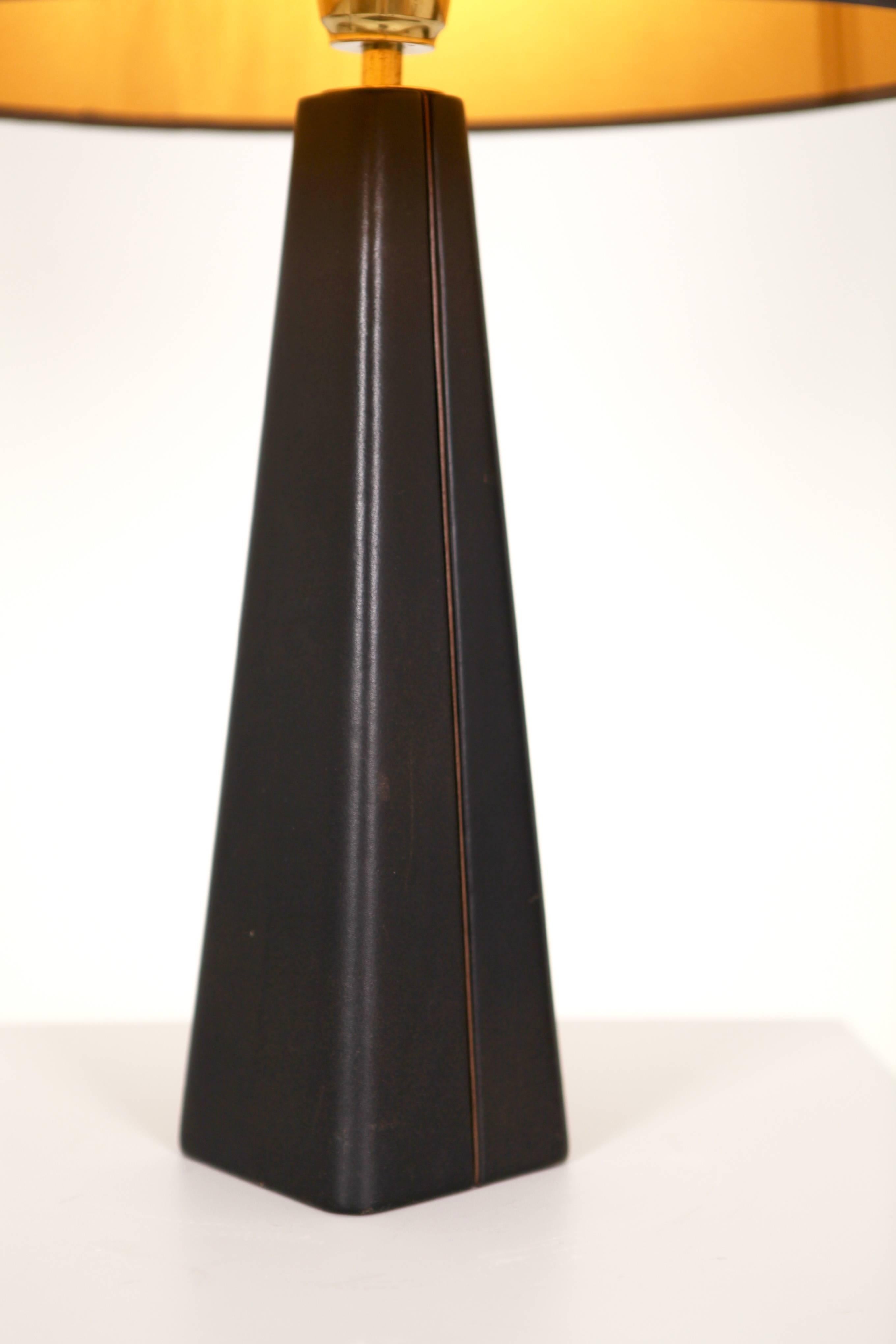 Lisa Johansson-Pape table lamp in dark brown and light brown detail leather,
Finland, 1960s.