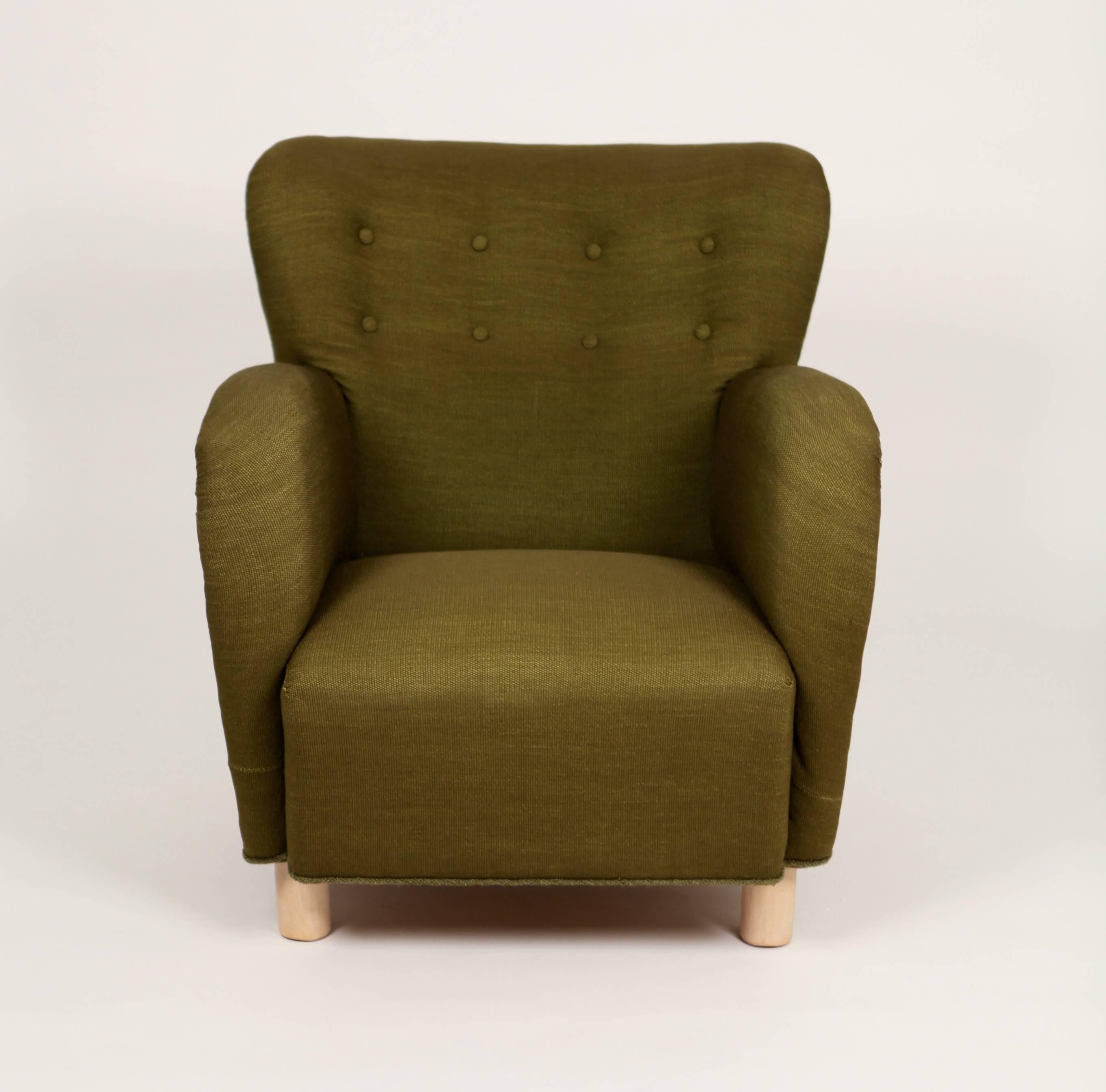 Flemming Lassen attributed armchair,
Denmark, 1930-1940.
Upholstered in green wool.
Legs in birch.