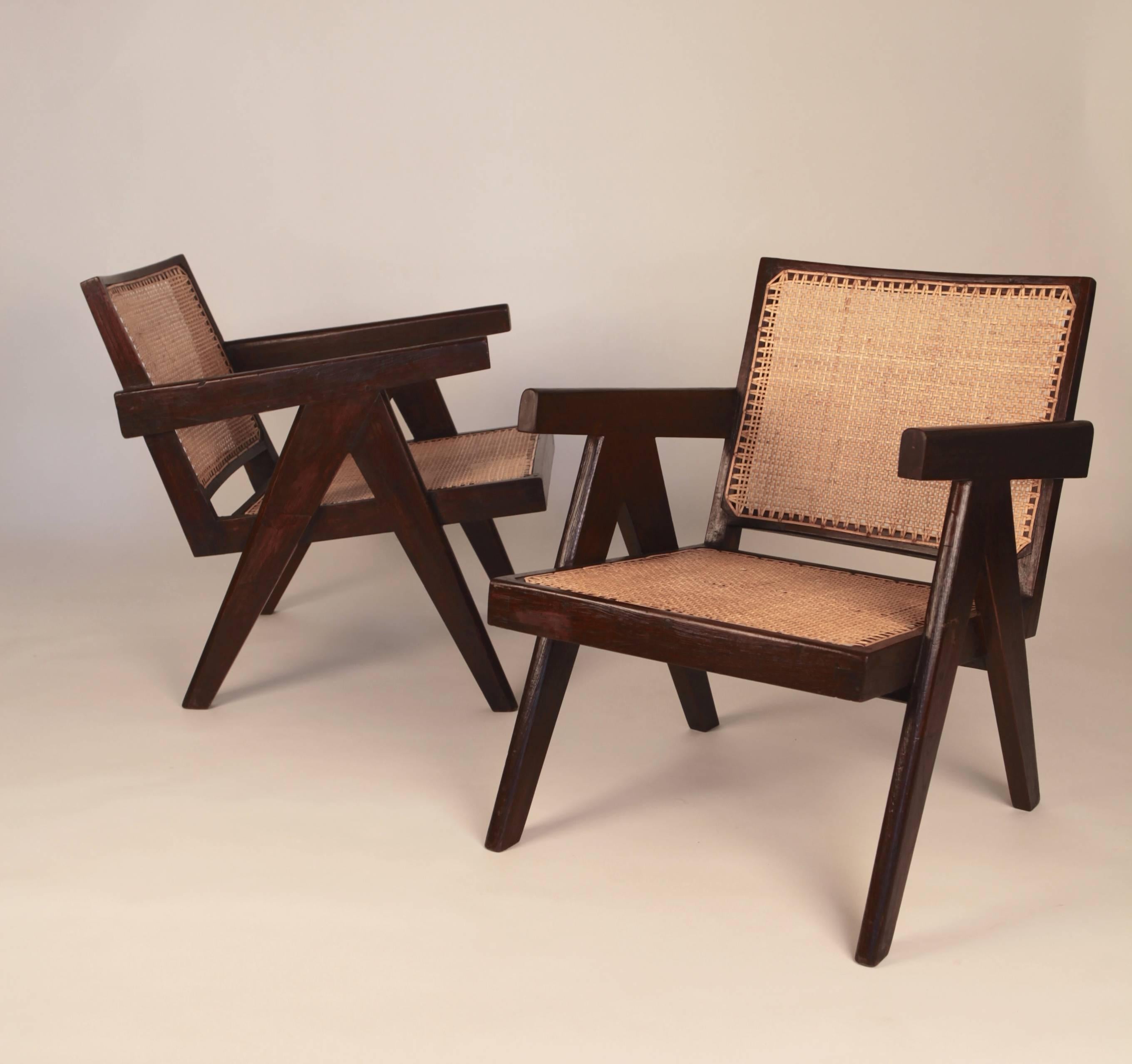 Pierre Jeanneret.

Pair of easy armchairs,

stained teak and cane.

Provenance: Chandigarh, India, 1955.

Literature: Le Corbusier Pierre Jeanneret, Chandigarh, India.

Galereie Patrick Seguin, pg. 176, 283.

Le Corbusier Pierre