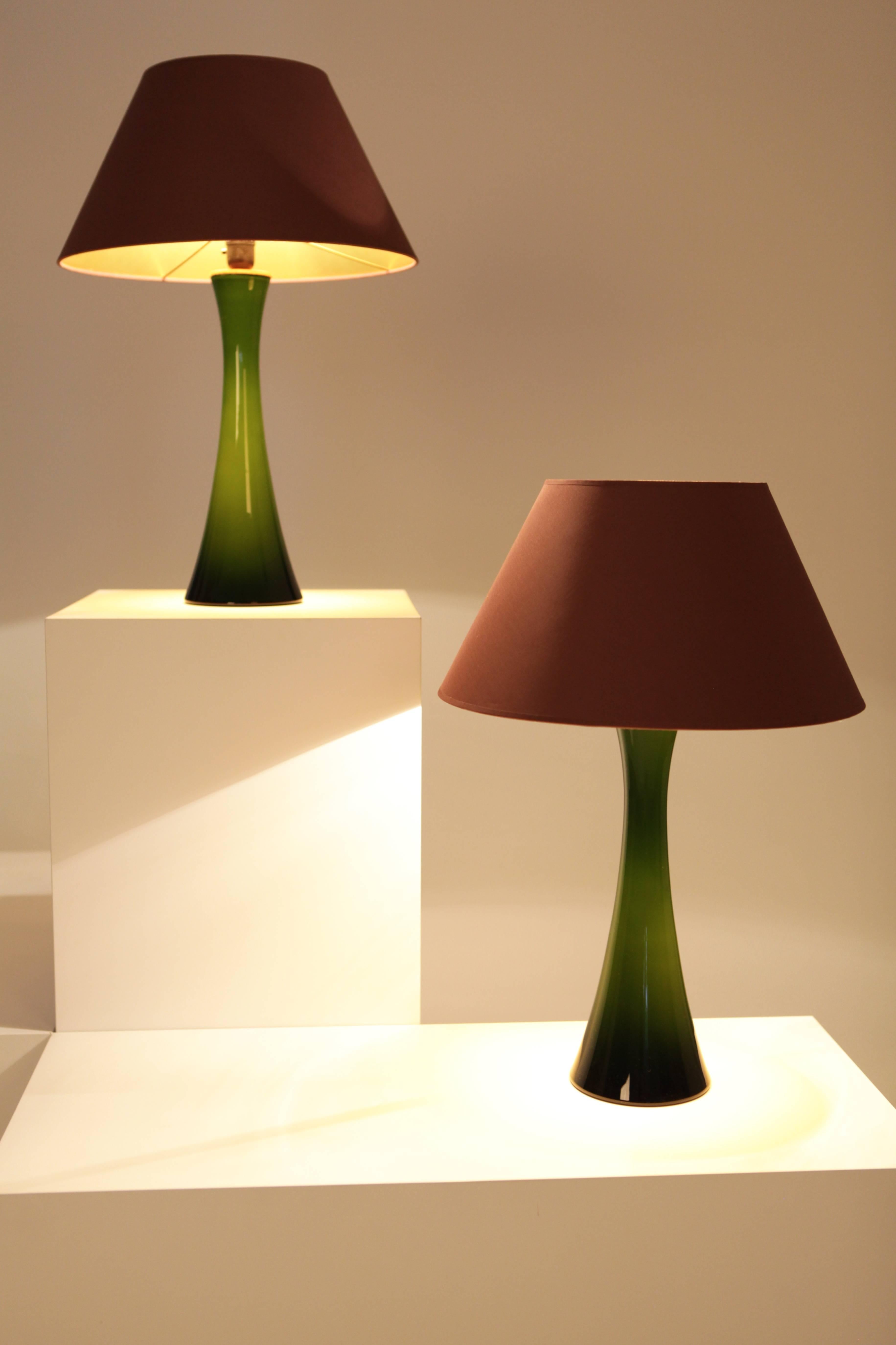 Bergboms table lamps,
designed by Berndt Nordstedt
Green glass and teak.
  