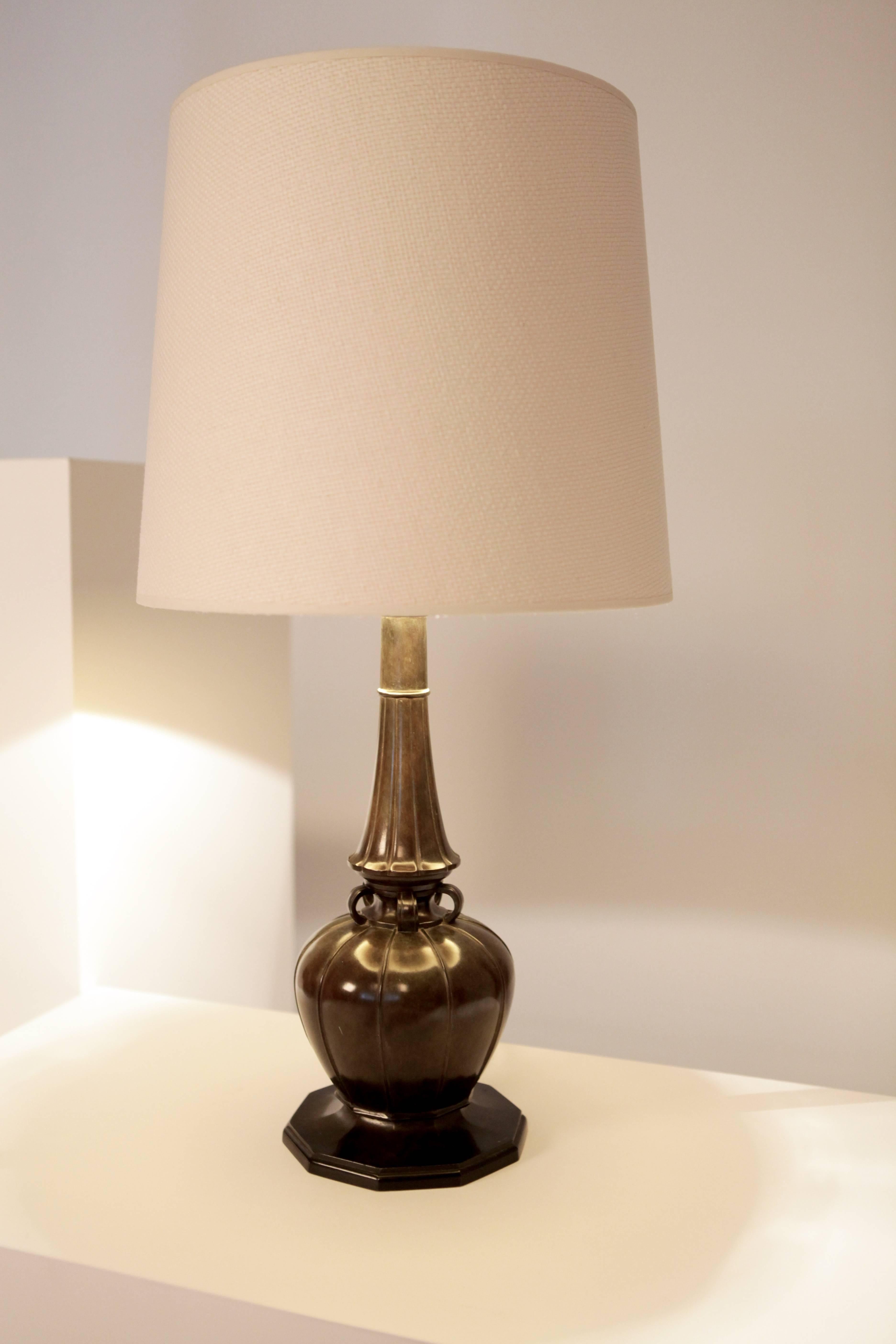 Just Andersen large table lamp, mod 2239.
Patinated diskometal,
Denmark, 1930.
Signed to the underside