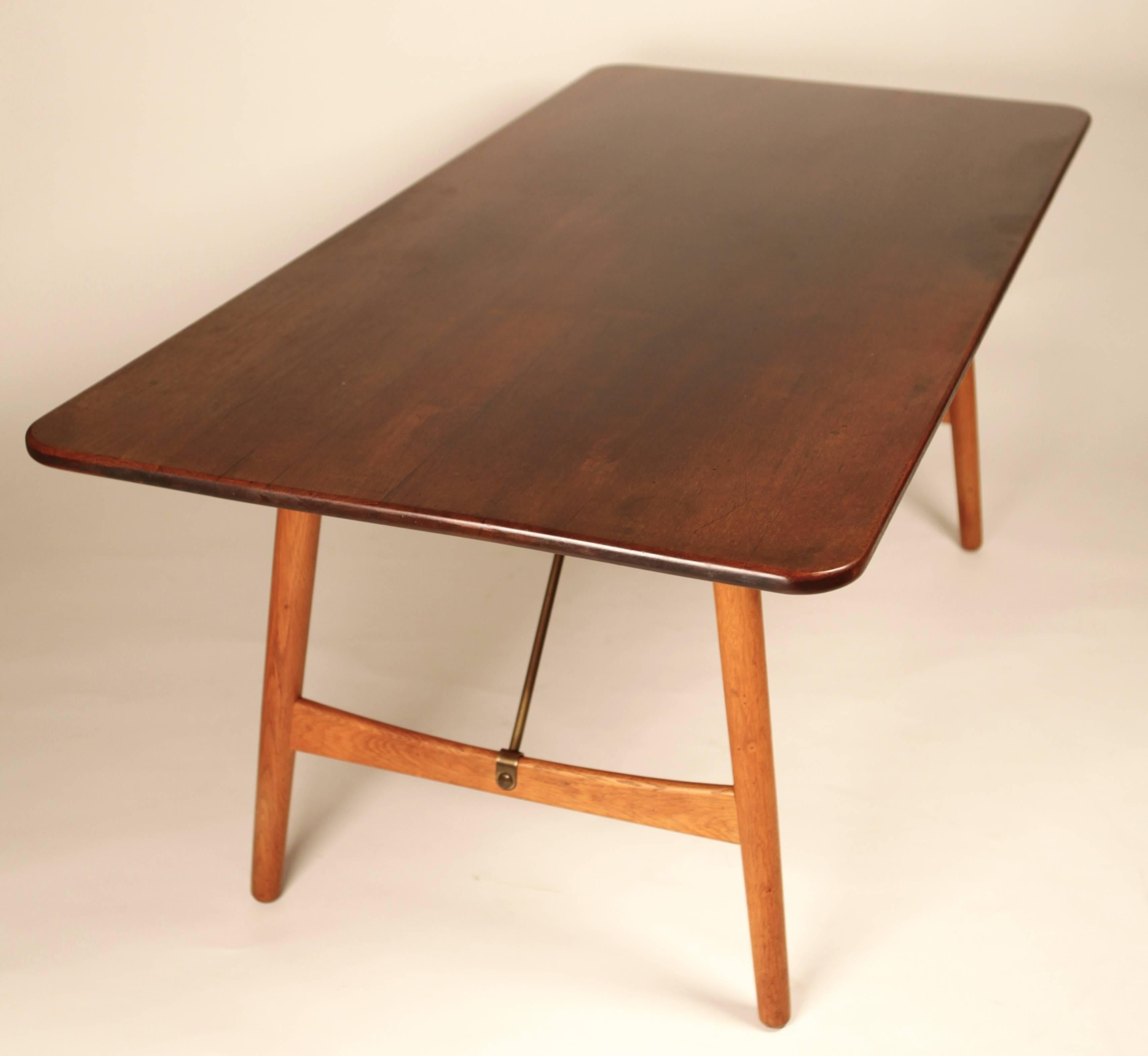 Borge Mogensen,
Hunting Table, solid teak top, oak legs and brass fittings,
designed in 1950,
produced by Soborg Mobelfabrik
Lit. Greta Jalk, Dansk mobelkunst through 40 years, pg. 154-155