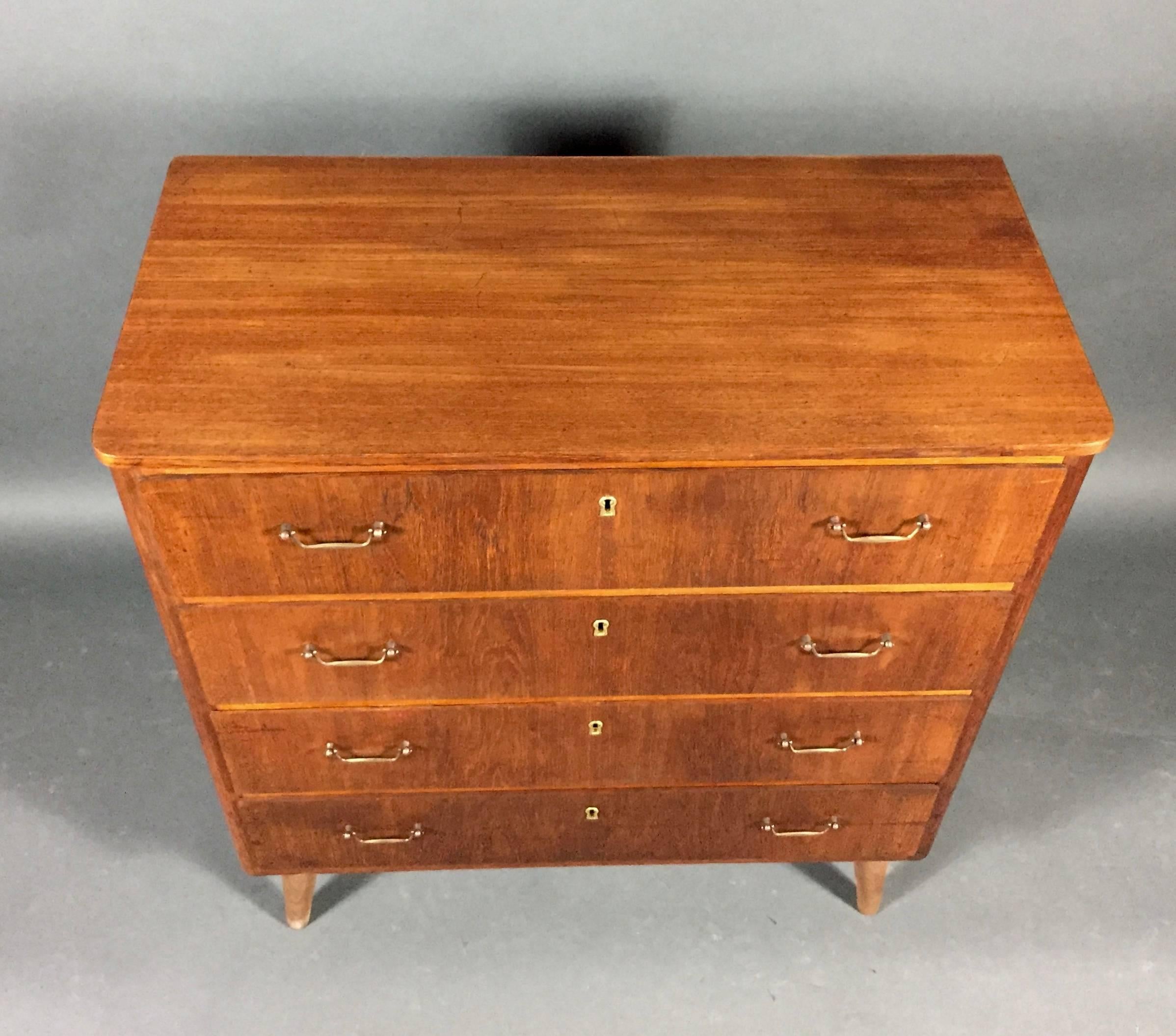 Swedish Veneered Wood and Brass Four-Drawer Chest, 1950s In Good Condition In Hudson, NY