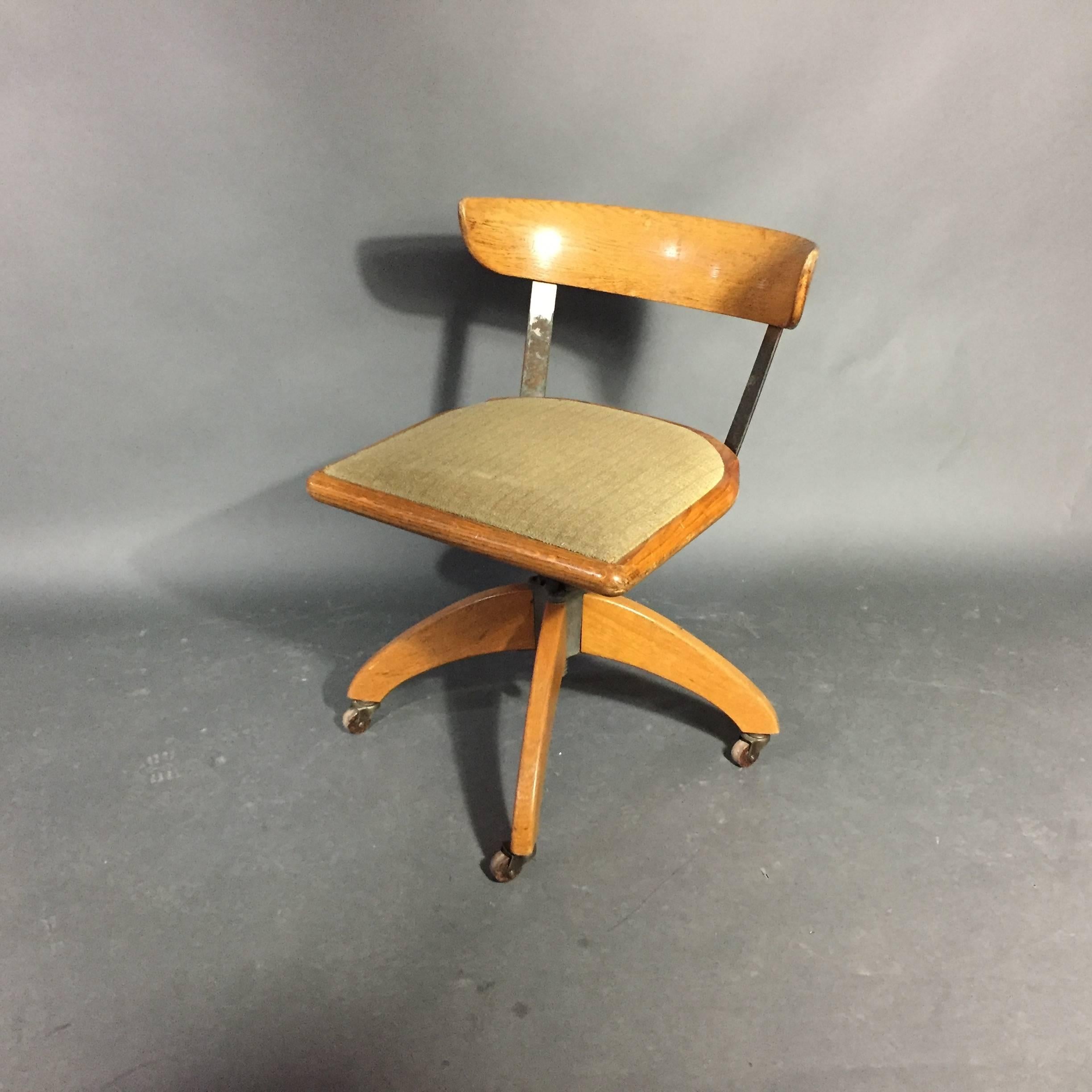 This very cool desk chair was purchased in Sweden and is from the 1930s or early 1940s. Oak framing with steel back support of beautifully curved back. Chair is adjustable and works well - original casters.
  