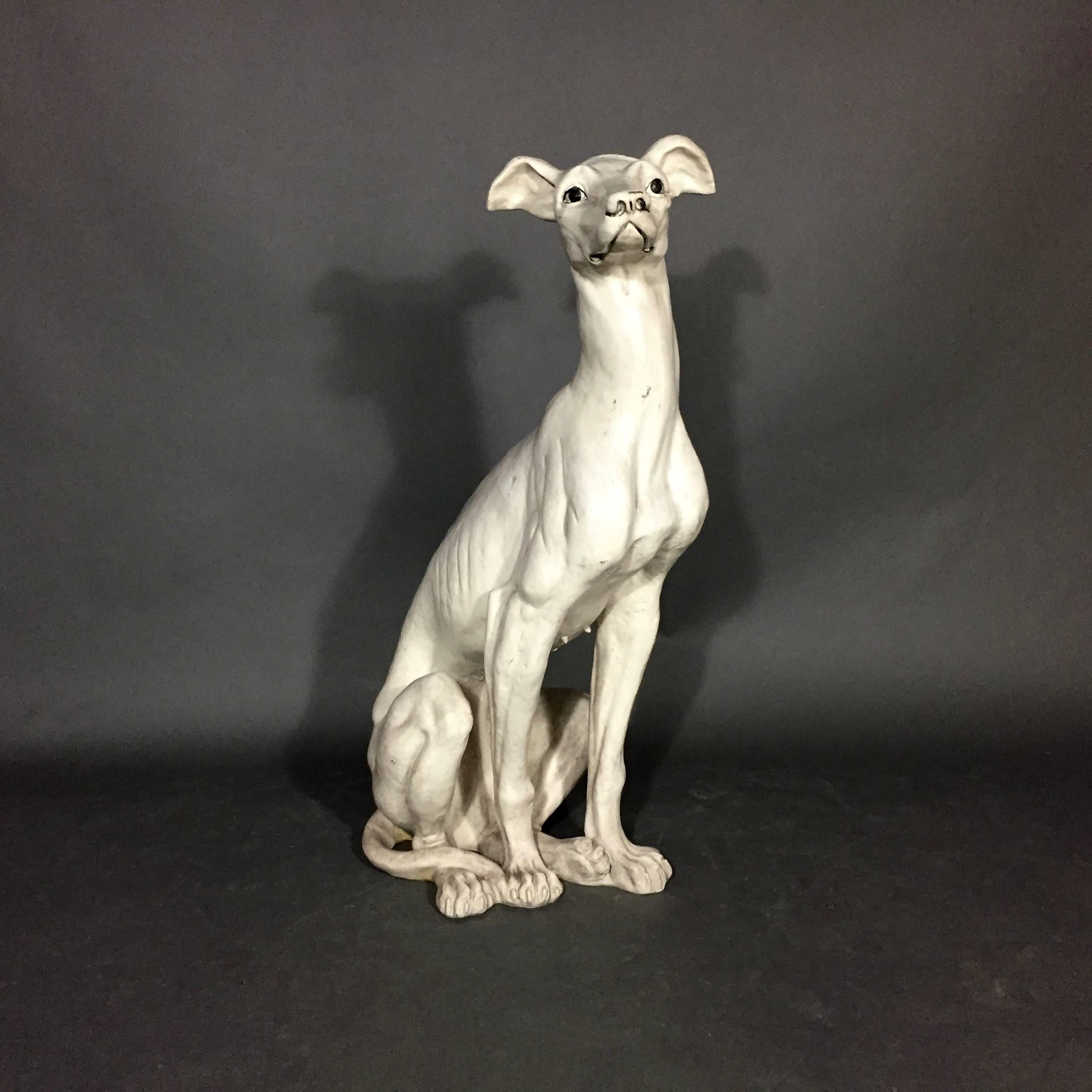 Tall, slender and graceful - the Italian Greyhound is swift and keenly sighted. This composite female example has a wonderful patina and in the Hollywood Regency style.