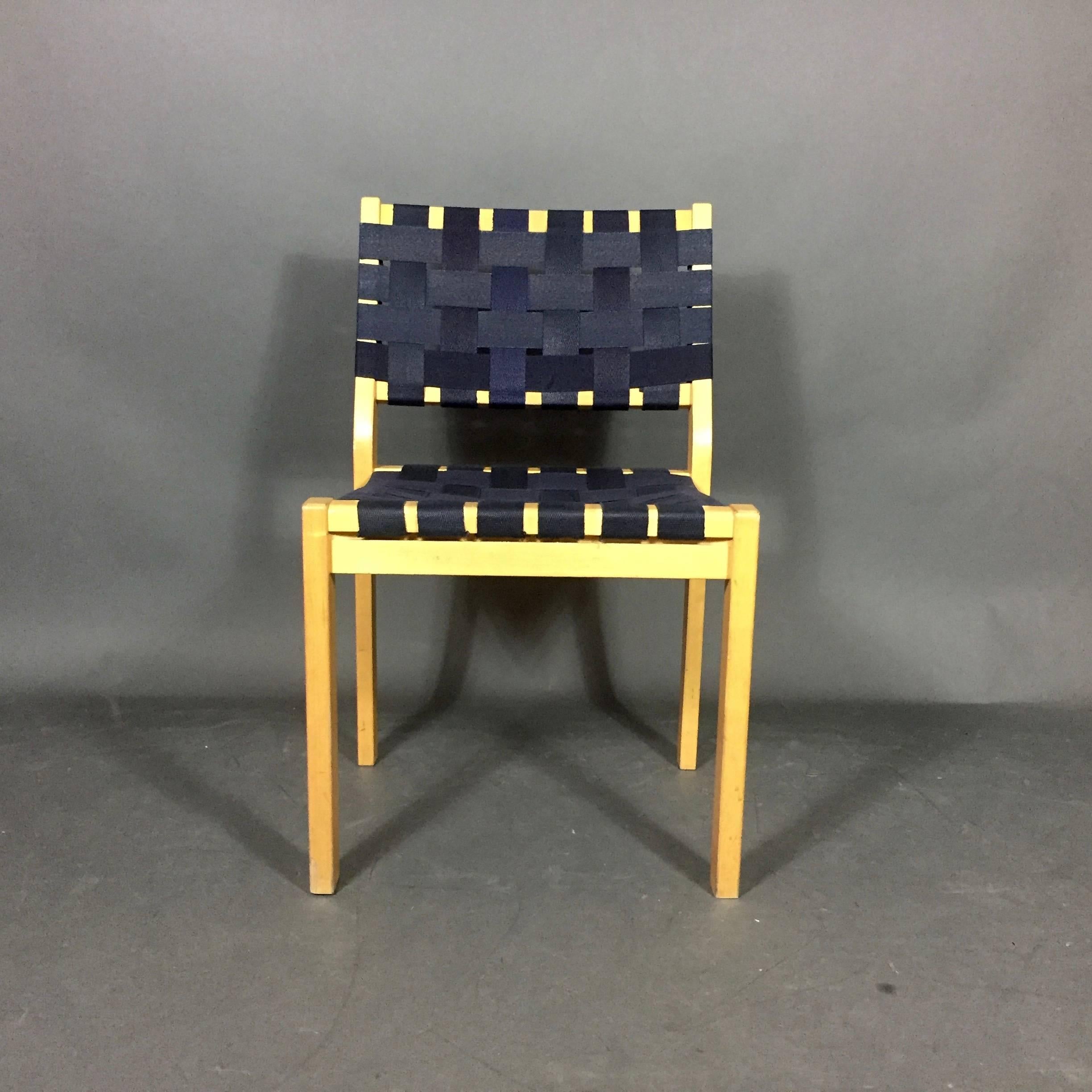 Always technically excellent with simplicity of design - architect Alvar Aalto and his Aino founded the incredible Finish firm Artek. This set of Model 611 dining chairs designed in 1929 are strapped with natural linen in a less common dark blue -