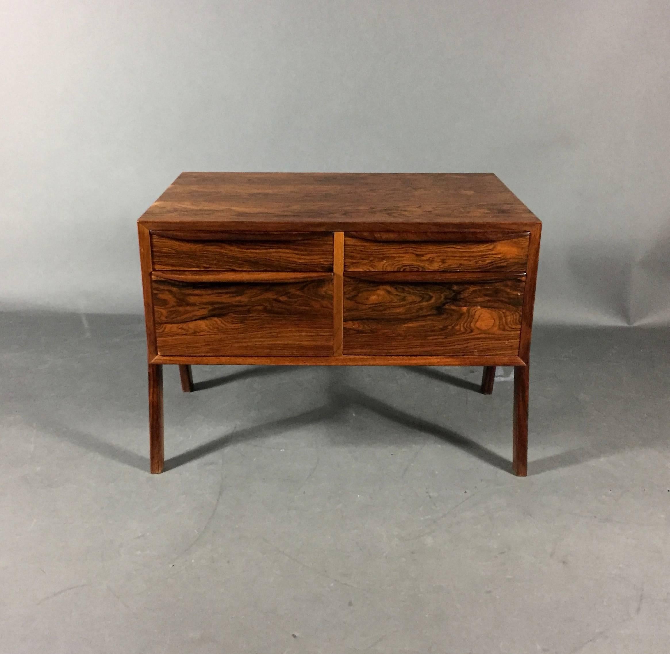 Originally designed as a sewing box with built in inserts for thread, bobbins, pins and other sewing notions. This small rosewood cabinet can be used as a side or end table with nicely proportioned A-frame side legs. Danish design, 1950s. Excellent