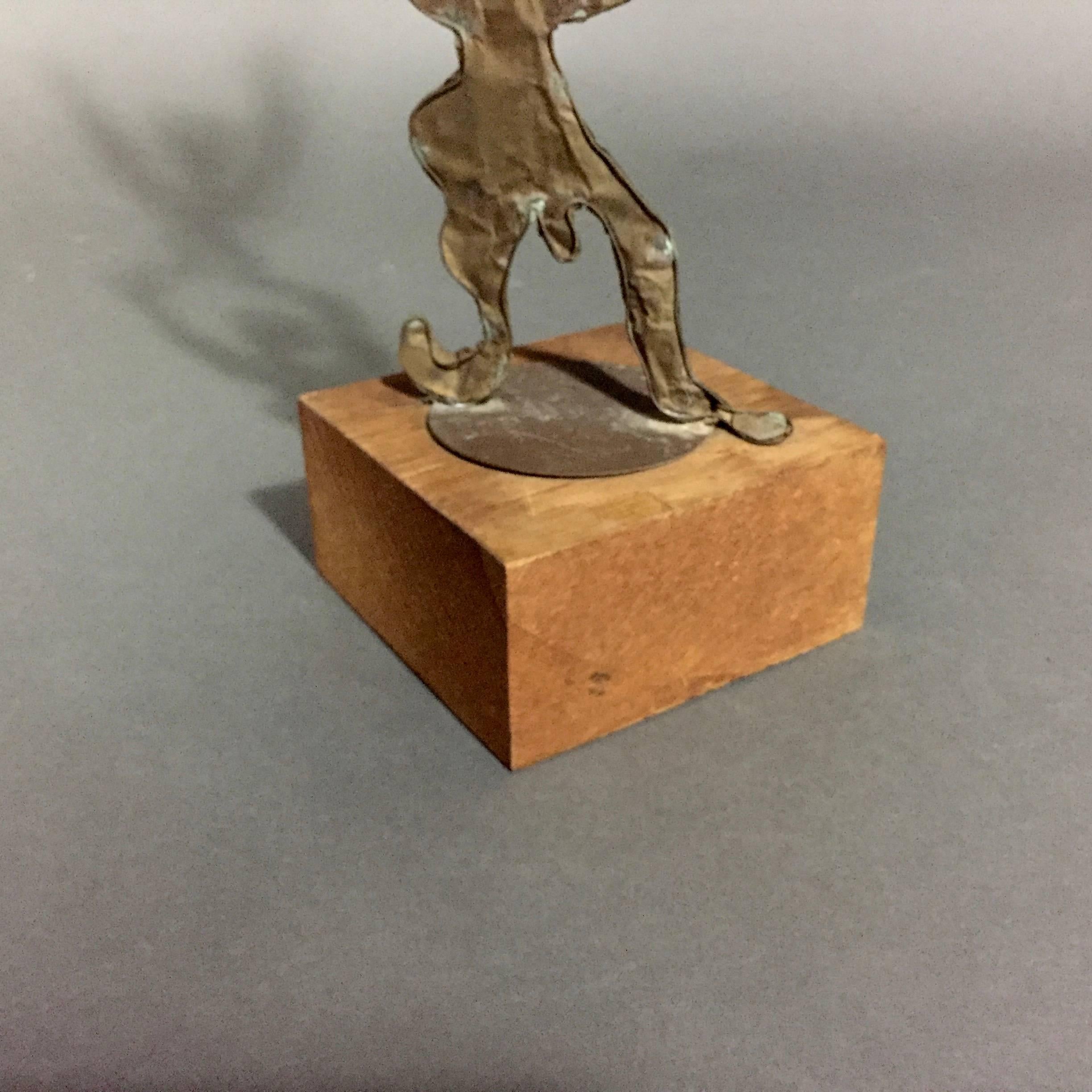 This metal and wire sculpture of circus performers was created between 1918 and 1922 by a Stevens Institute of Technology student and gifted to fellow student John Glover - who kept this in his private collection until his death in 1996.  It has