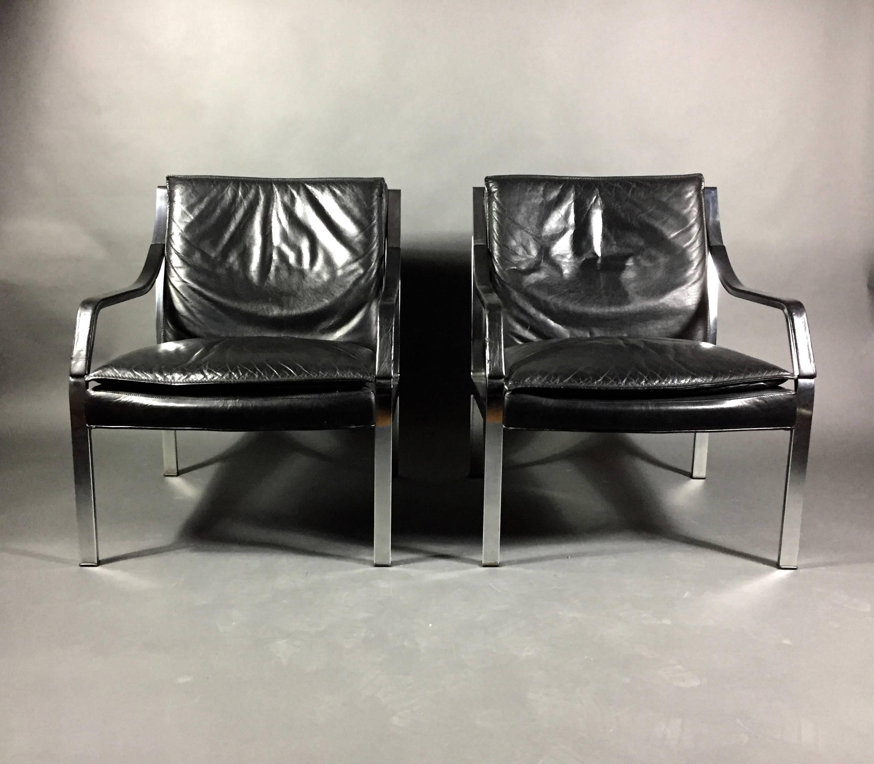 A pair of Preben Fabricius armchairs designed for the Art Collection series by Walter Knoll, Germany in early 1970s. These are an incredibly solid pair constructed with chromed square steel tube frames and black leather seating. Note the tight